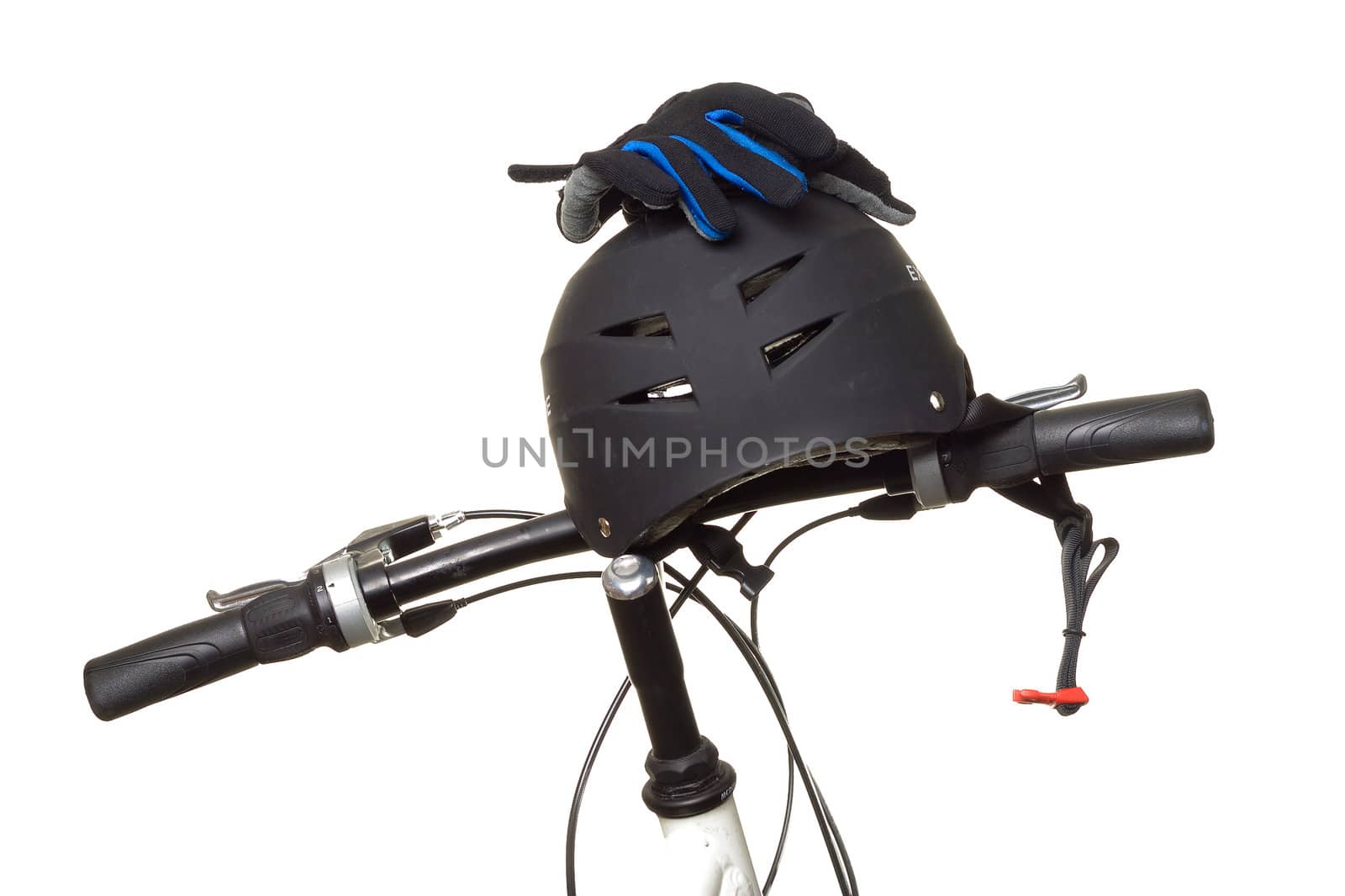 Bicycle handlebar with a helmet and gloves resting on top