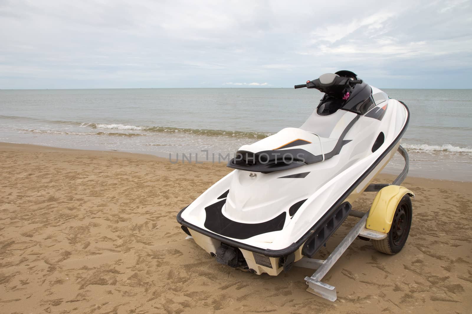 Small motorboat on the beach in Thailand