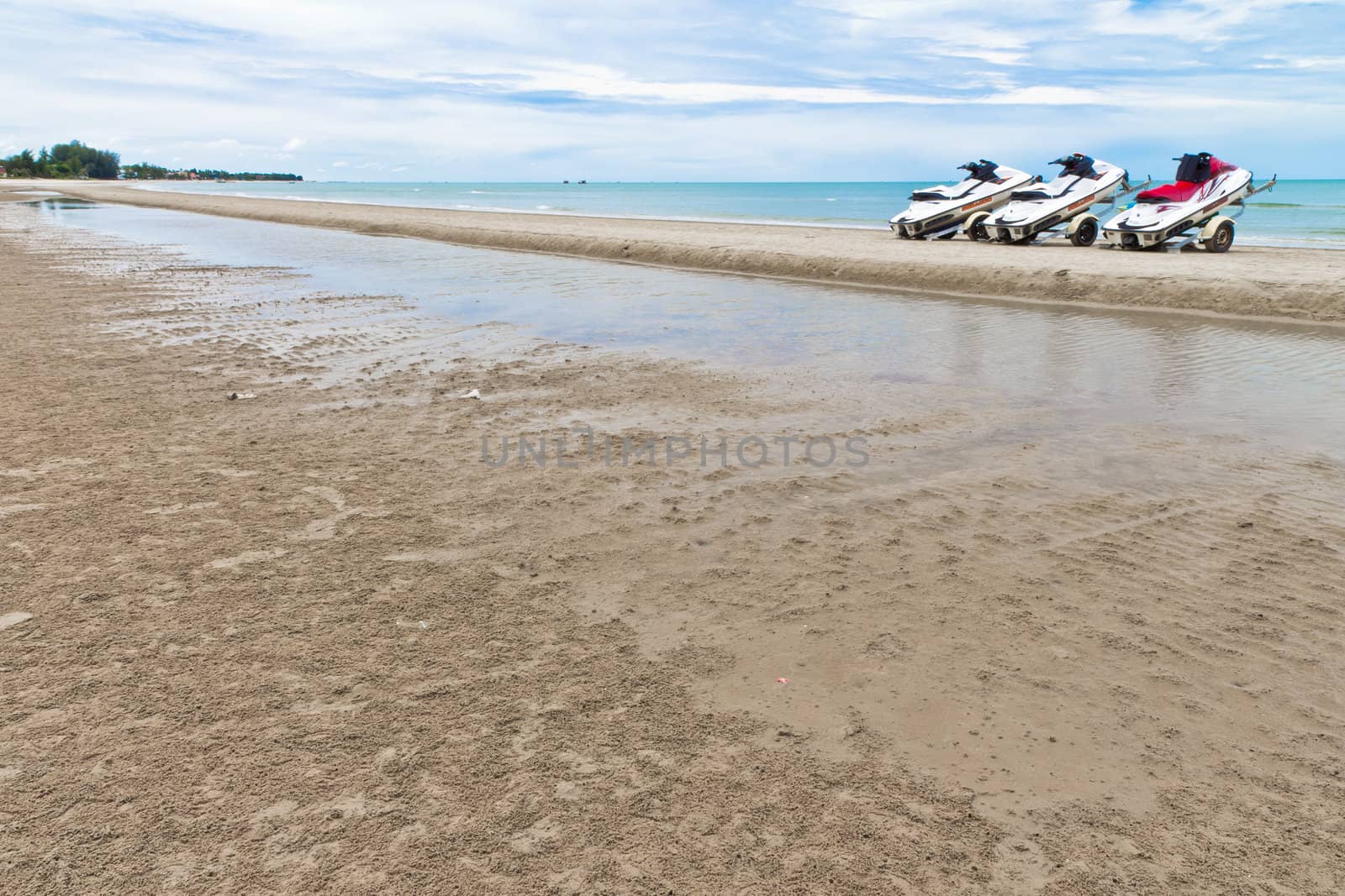 Small motorboat on the beach in Thailand.