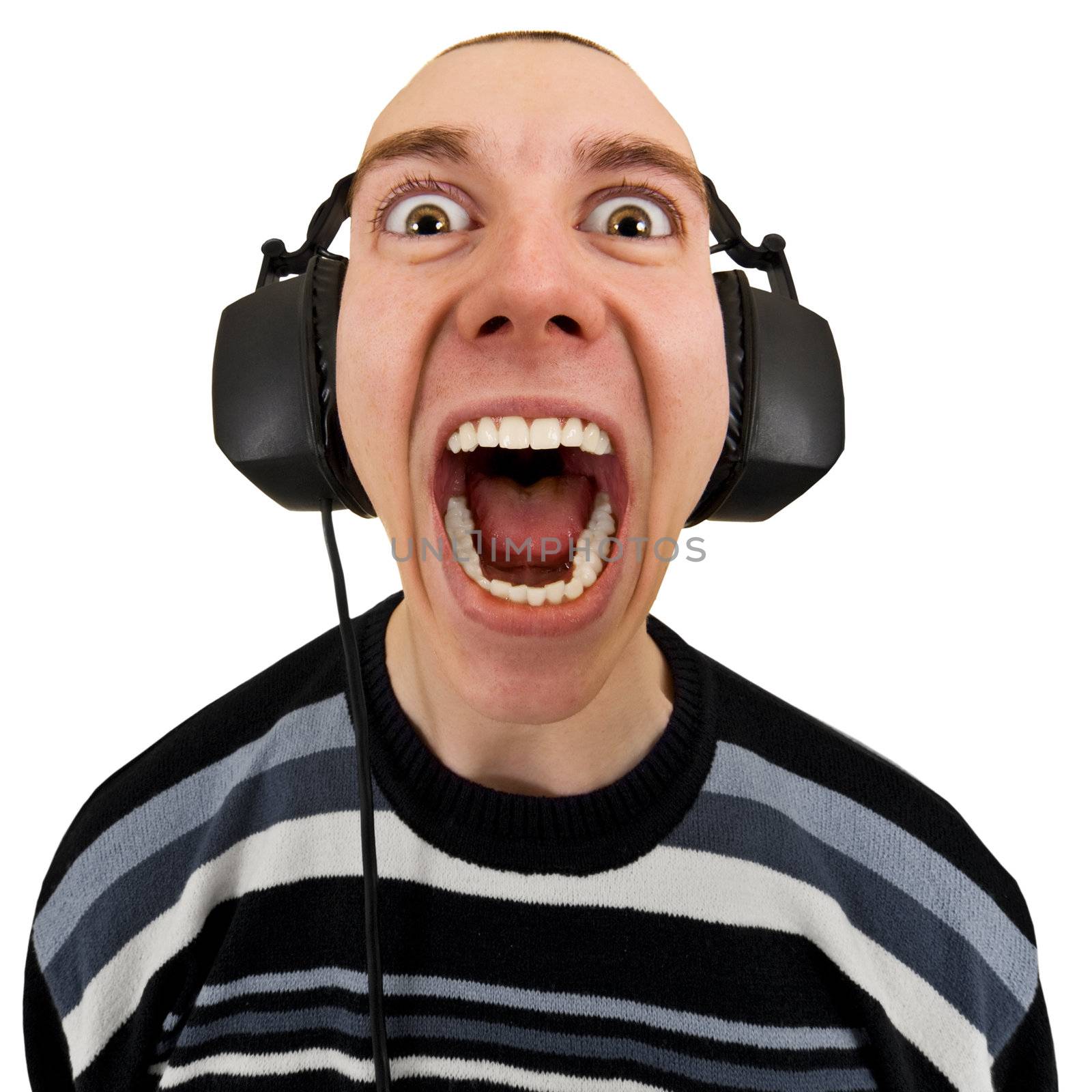 Funny man in the stereo headphones shouting isolated on a white background