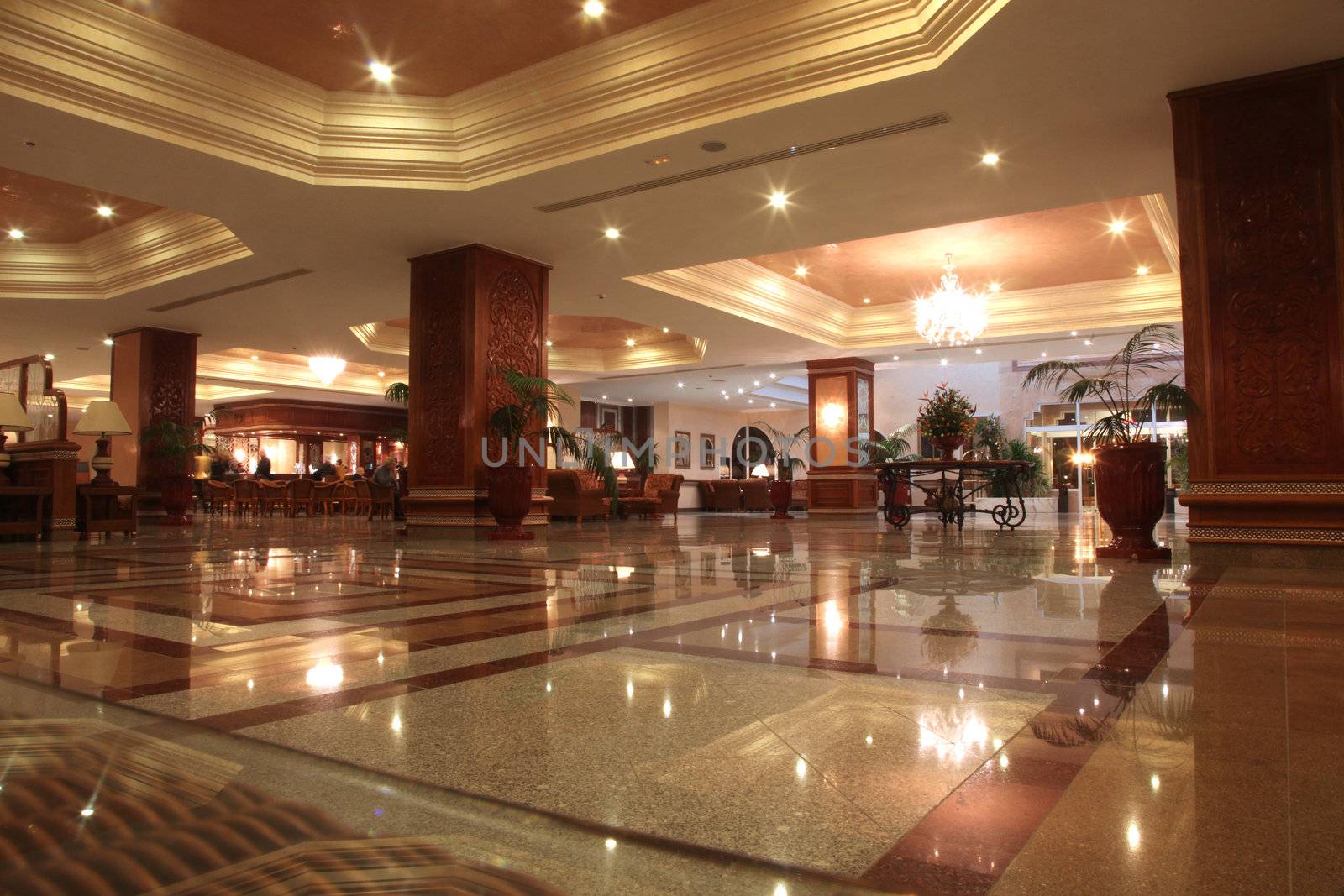Modern hotel lobby with marble floor