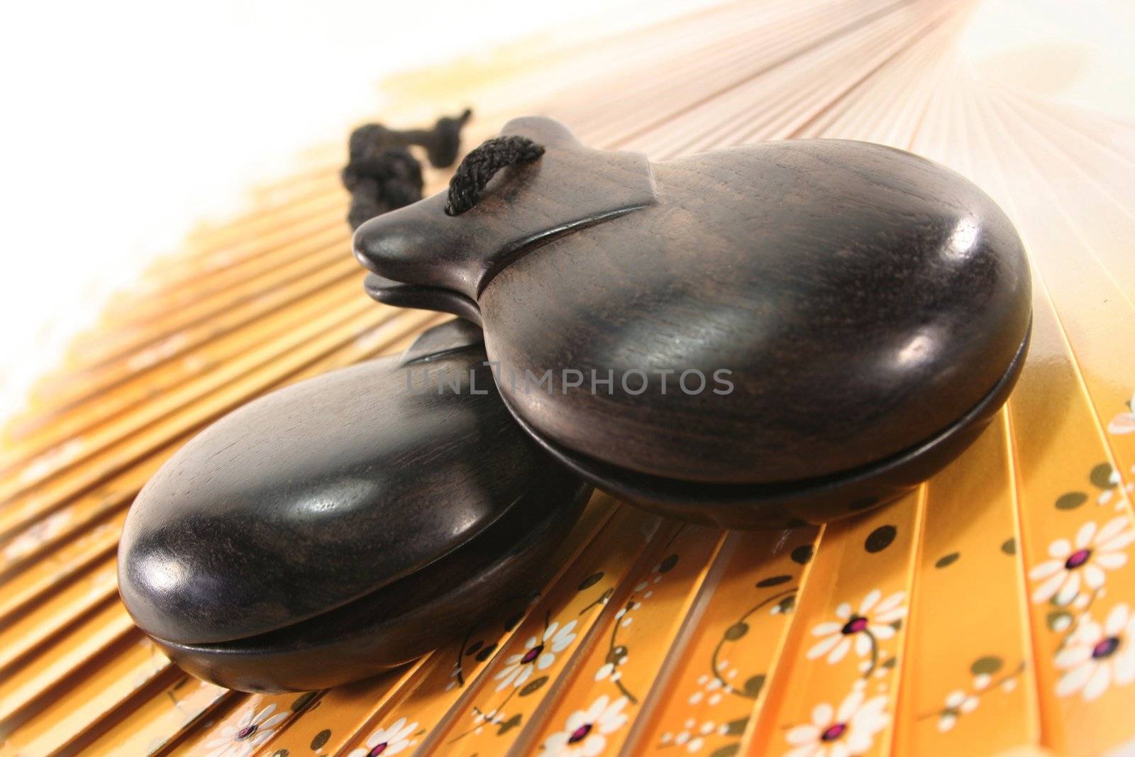 two castanets on a Spanish fan