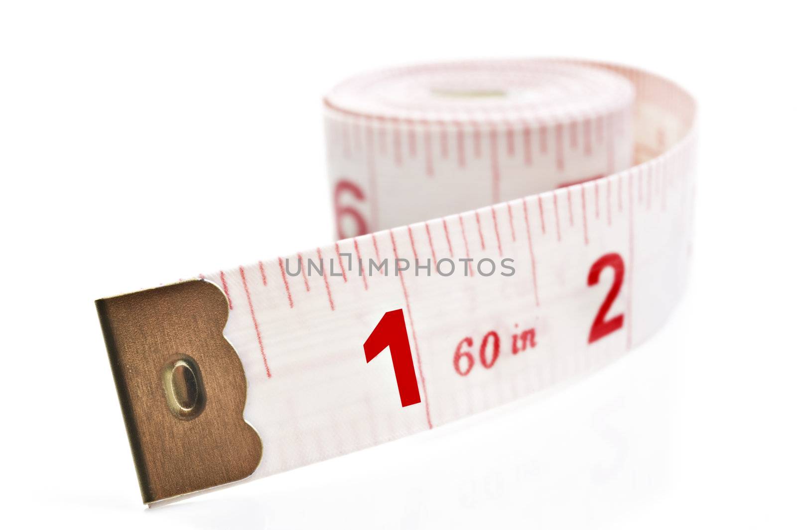 White and red tape measure on a white background with space for text