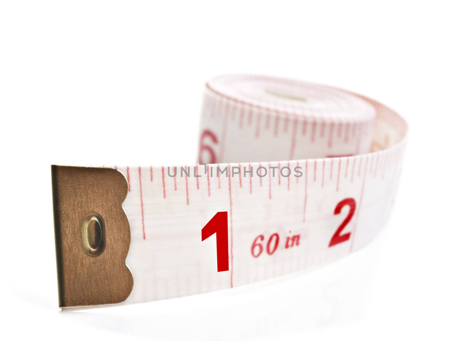 White and red tape measure on a white background with space for text