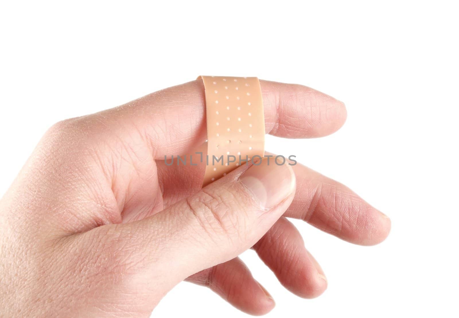 Someone attaching a patch to a finger