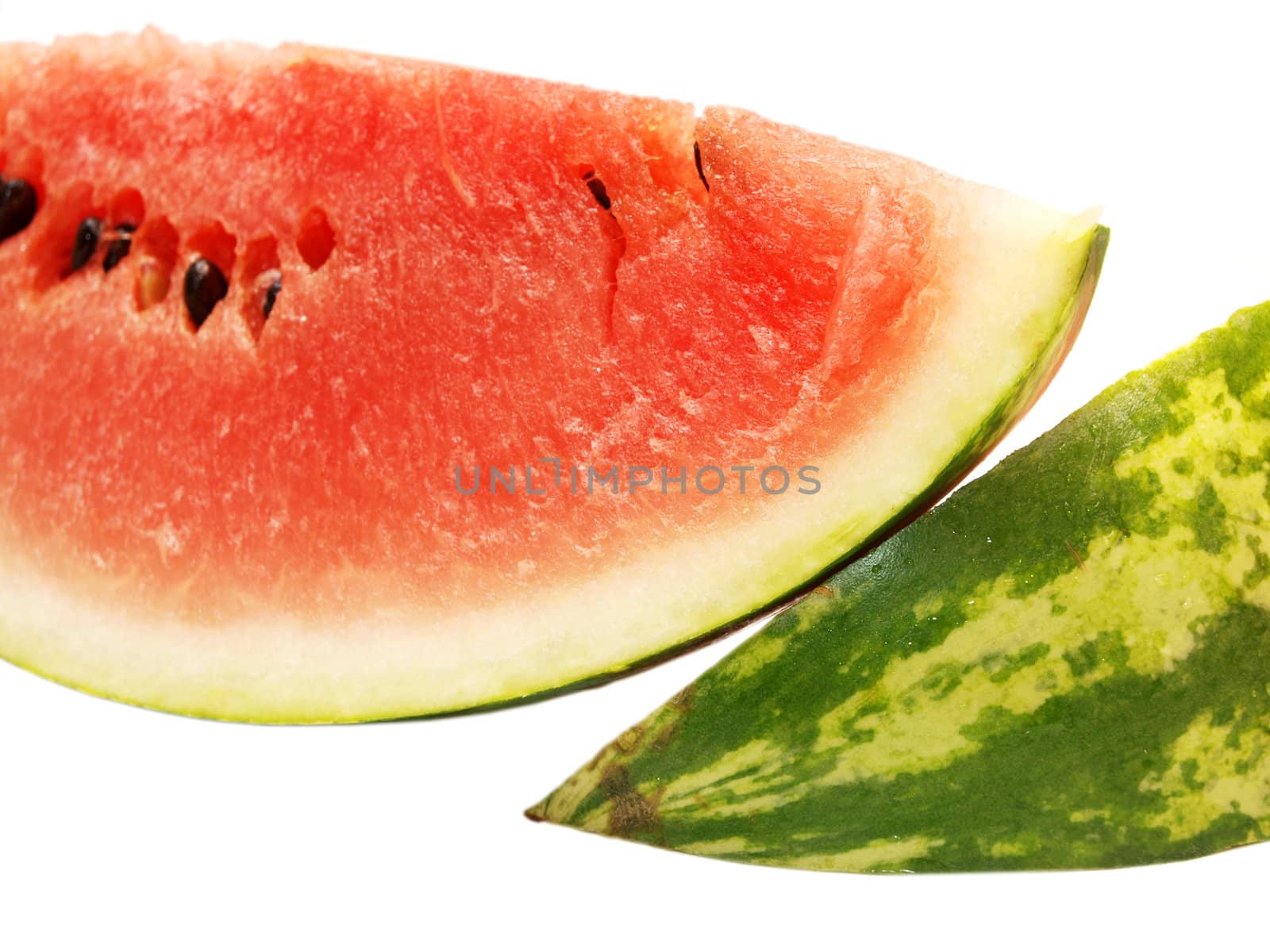Red watermelon in slices towards white background