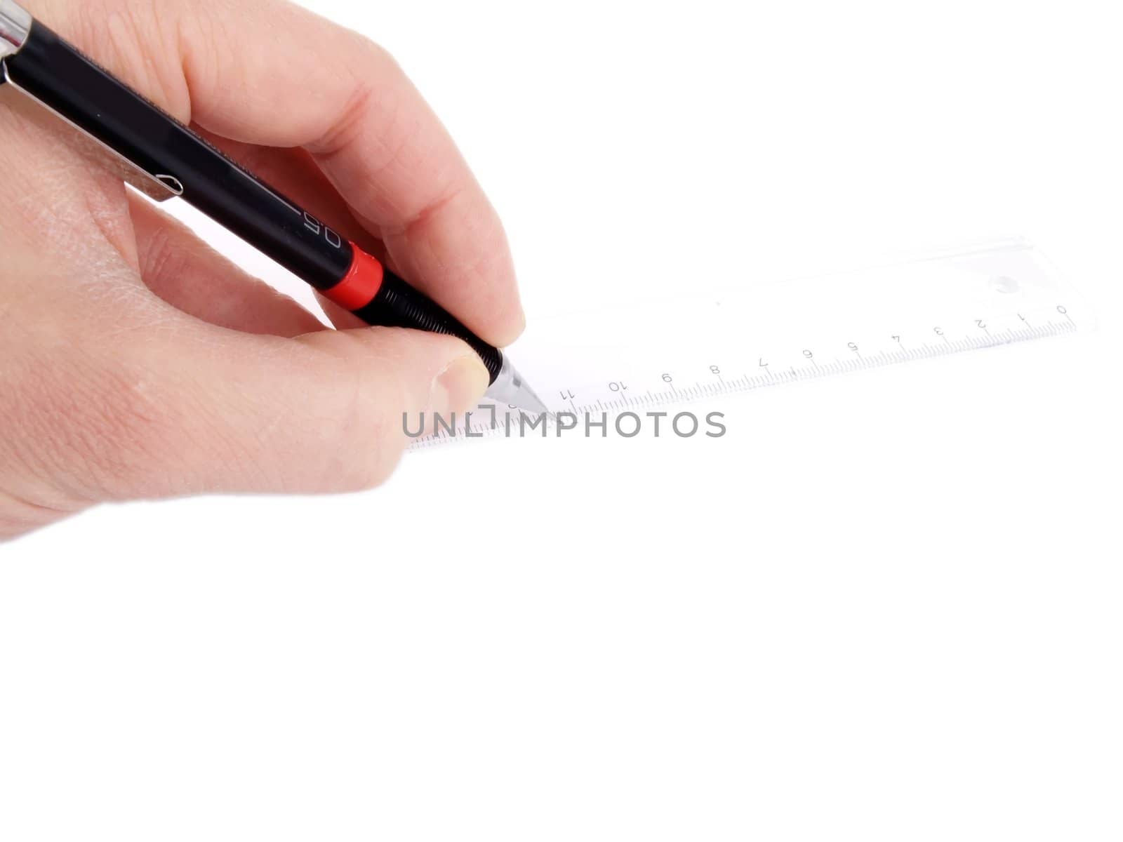 Someone drawing a straight line, with a pencil against a ruler on white paper