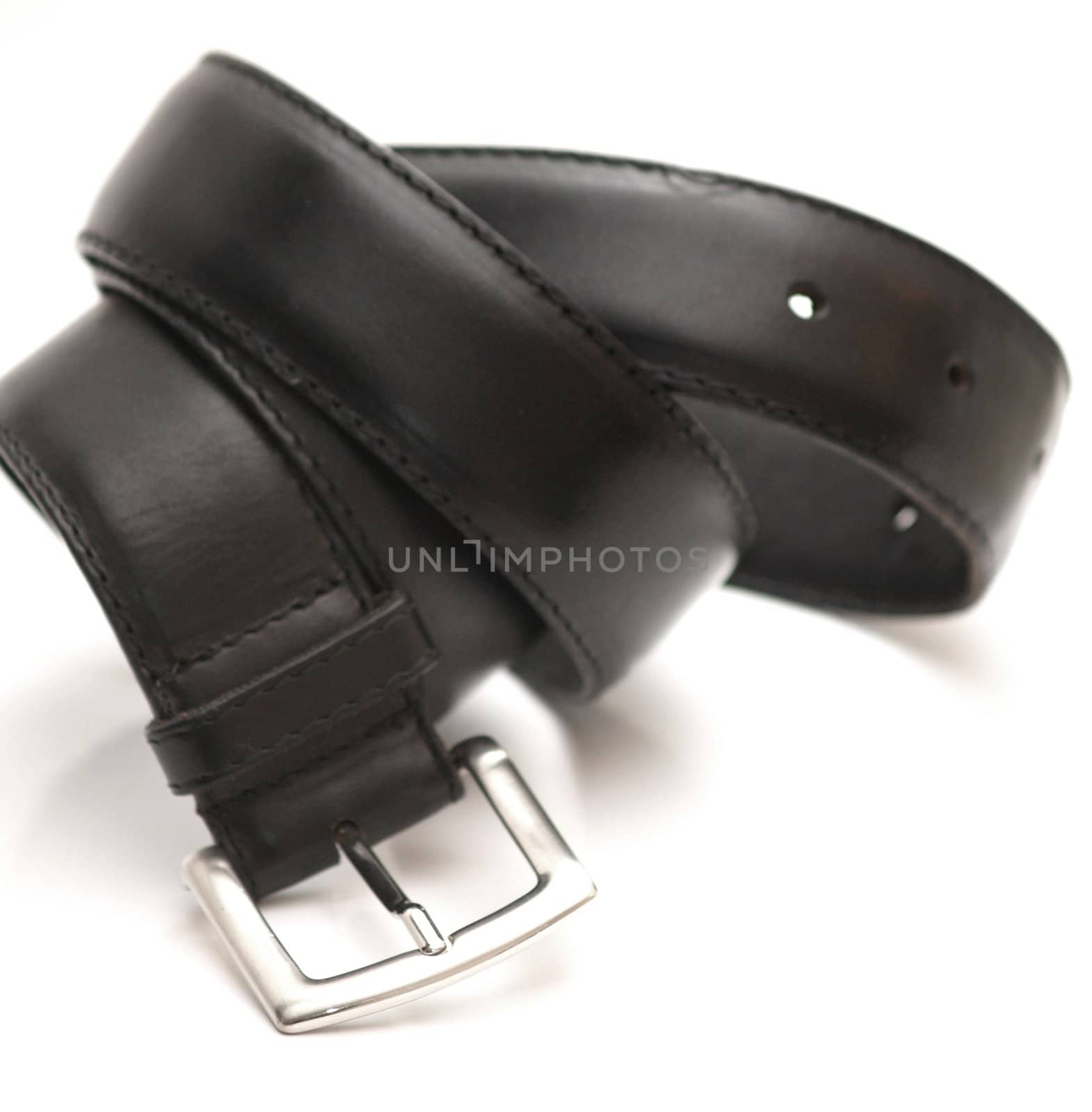 Black leather belt on white background 