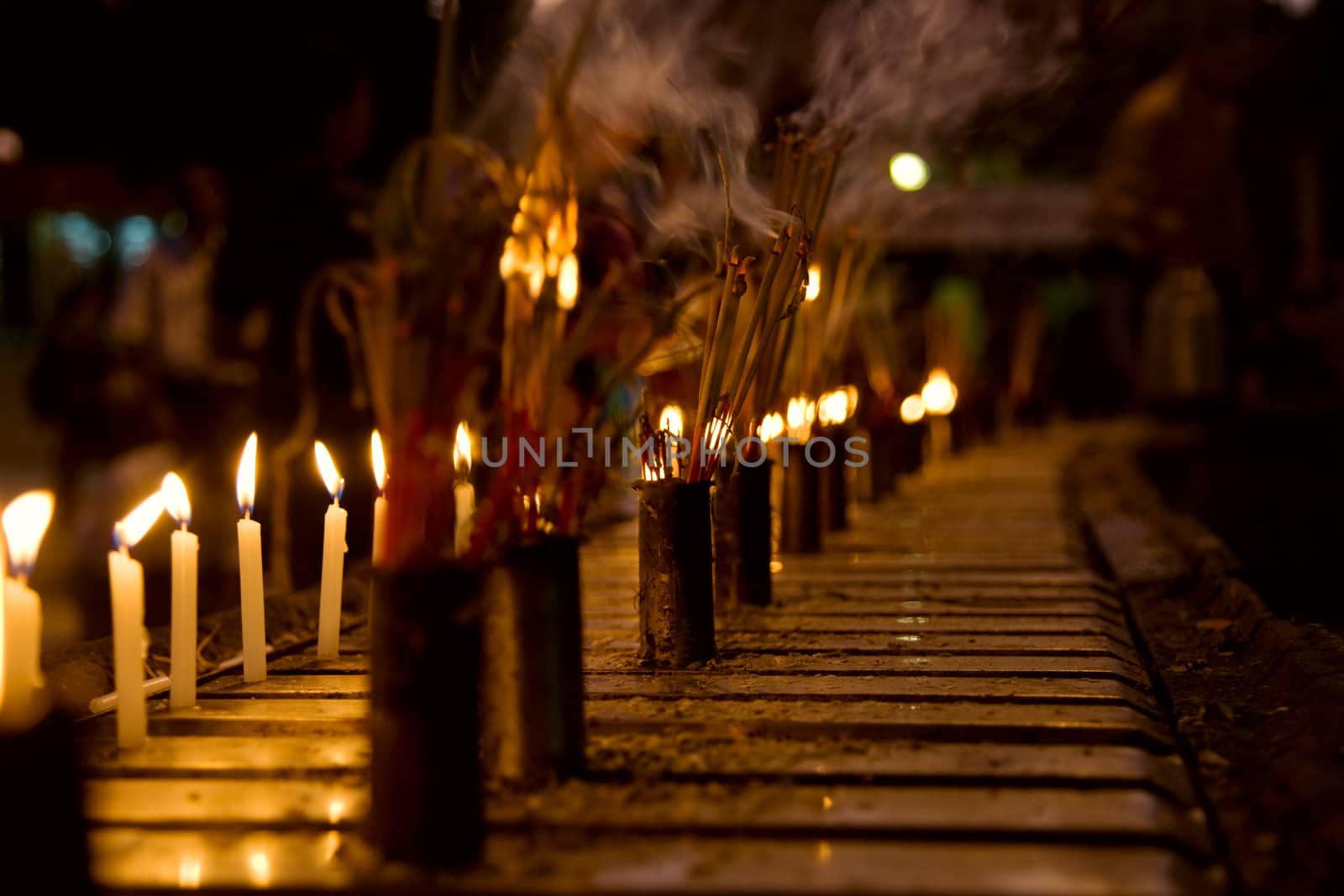 Burning Incense sticks and candle . Altar at Shwedagon Pagoda, Myanmar