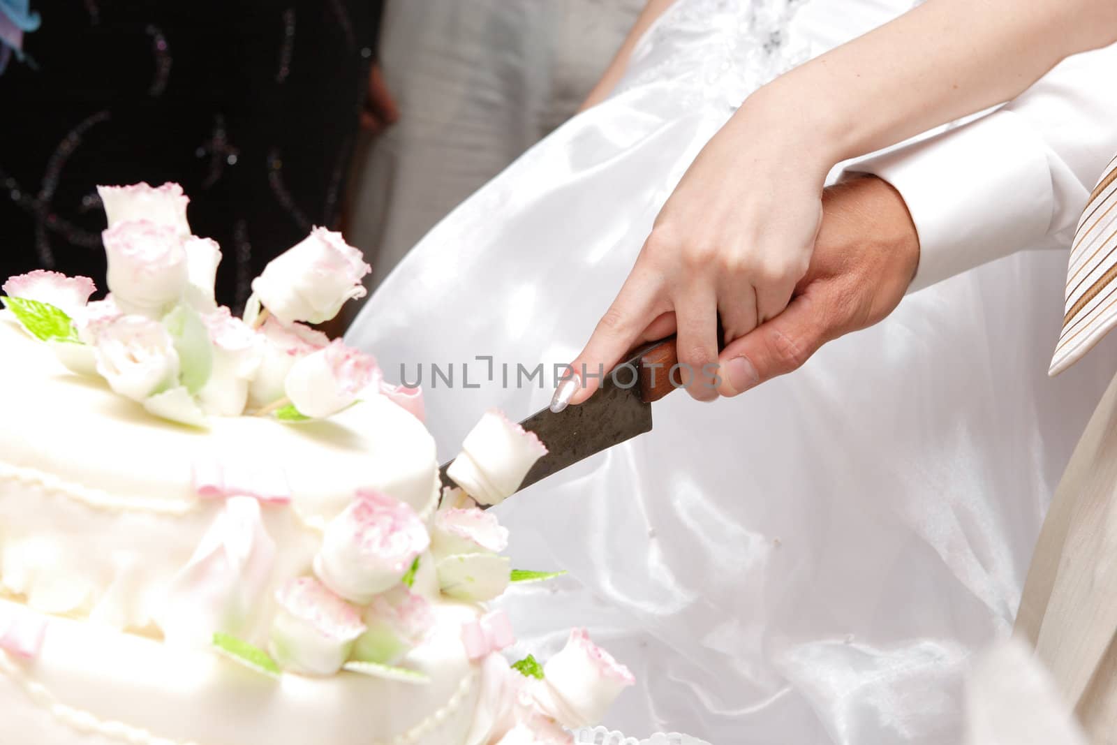 cutting a wedding cake by vsurkov