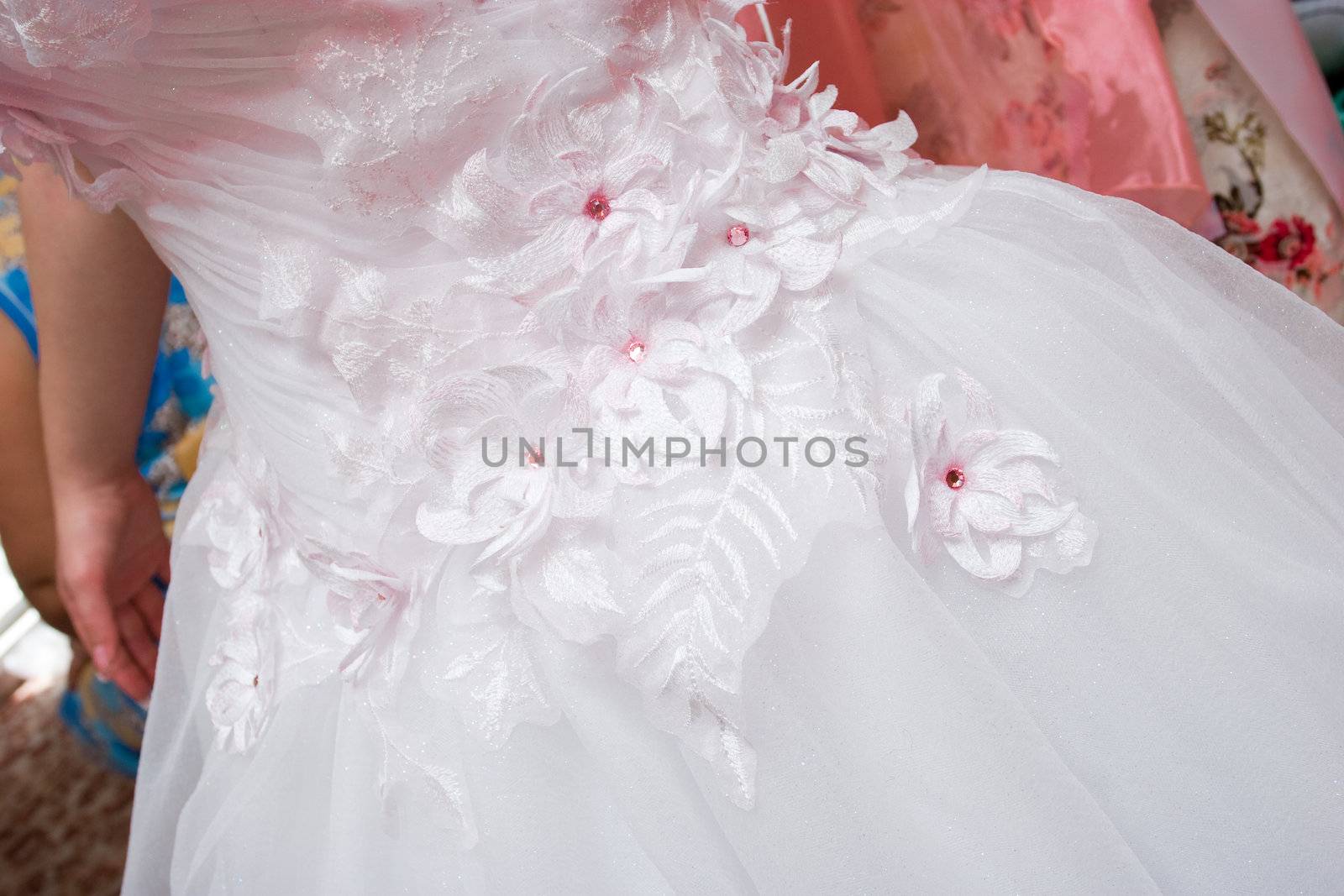 a part of the beautiful dress of the bride