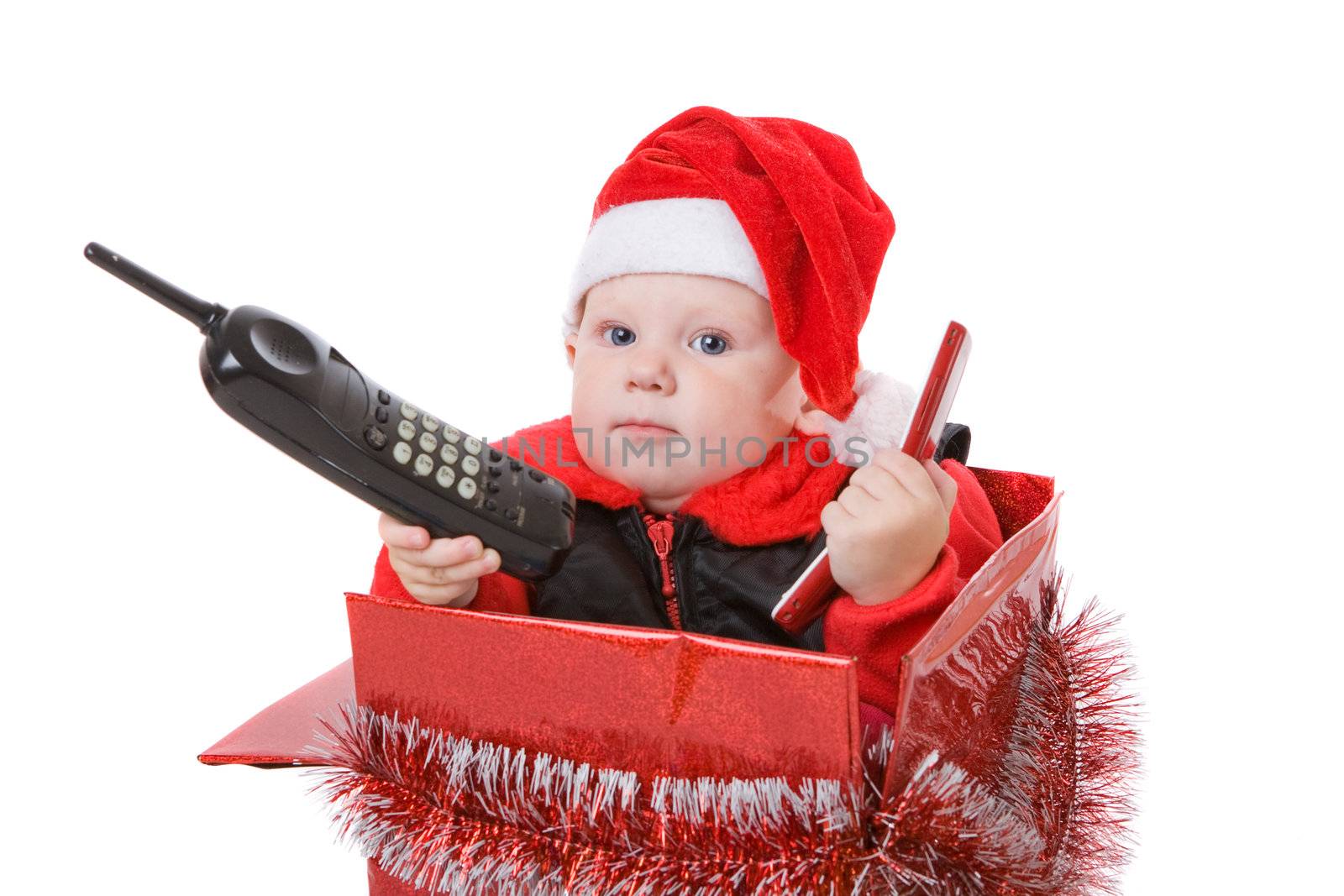 infant calling by phone in the christmas box by vsurkov