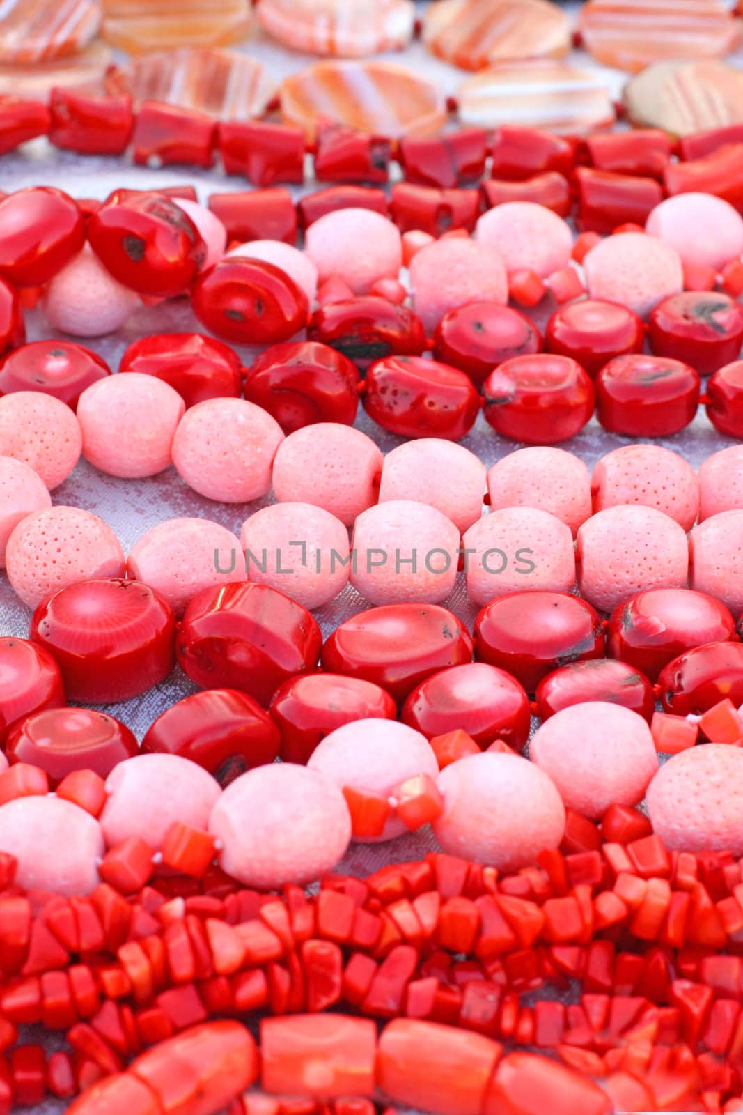 Close up of the pink and red coral beads.