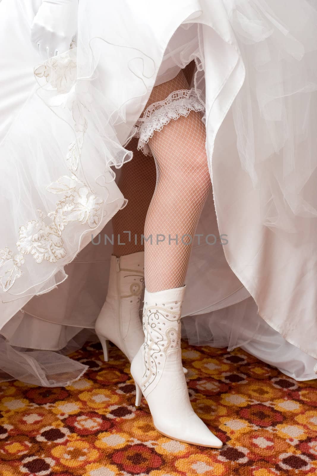 a sexy leg of the bride in a boot by vsurkov