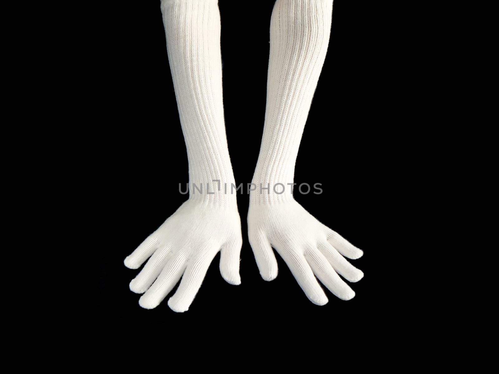 Two women hands in woolen gloves