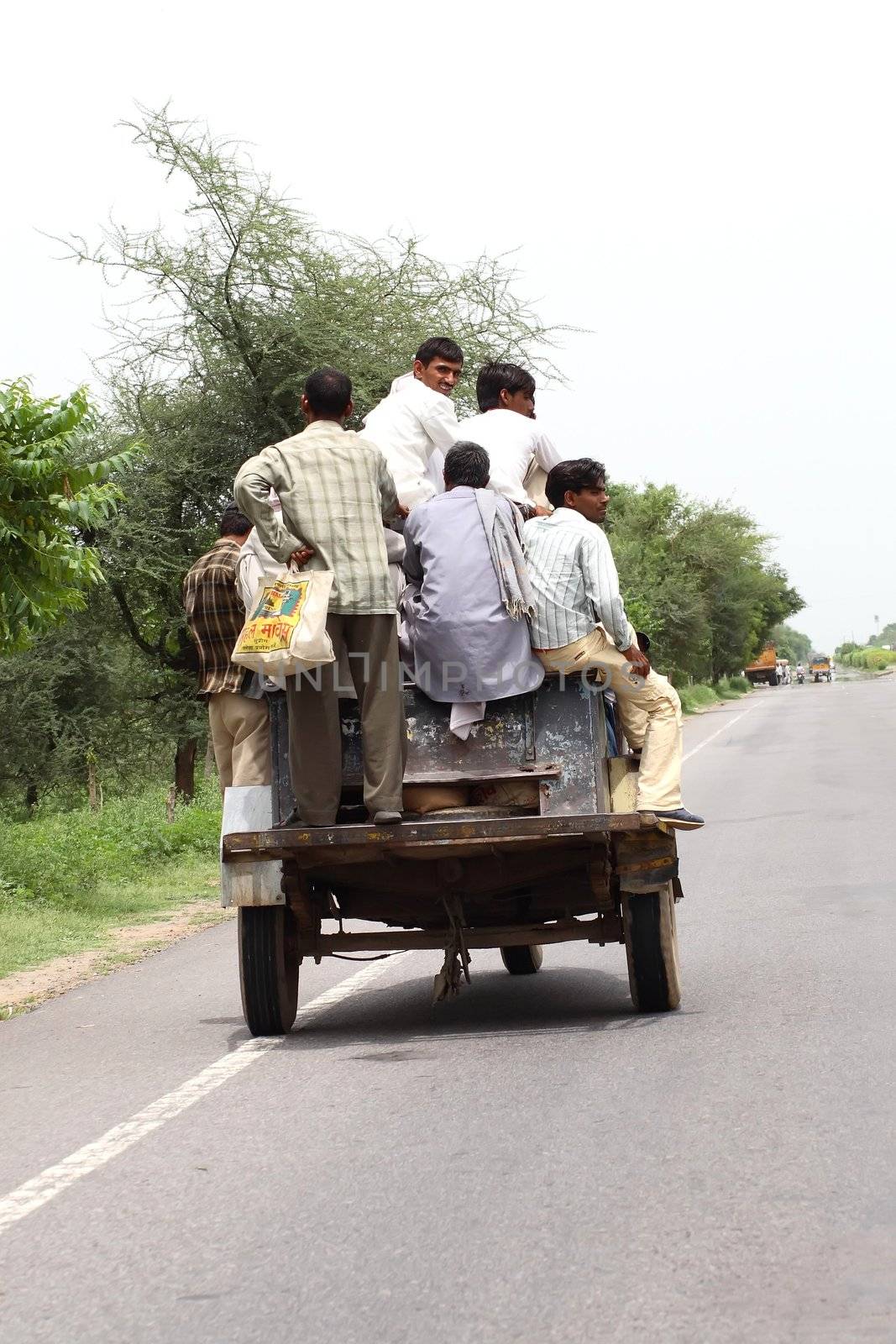 small open car with people