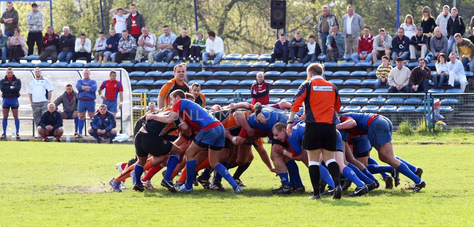 An action during a rugby match. a particular moment during an poland rugby match of 1st division