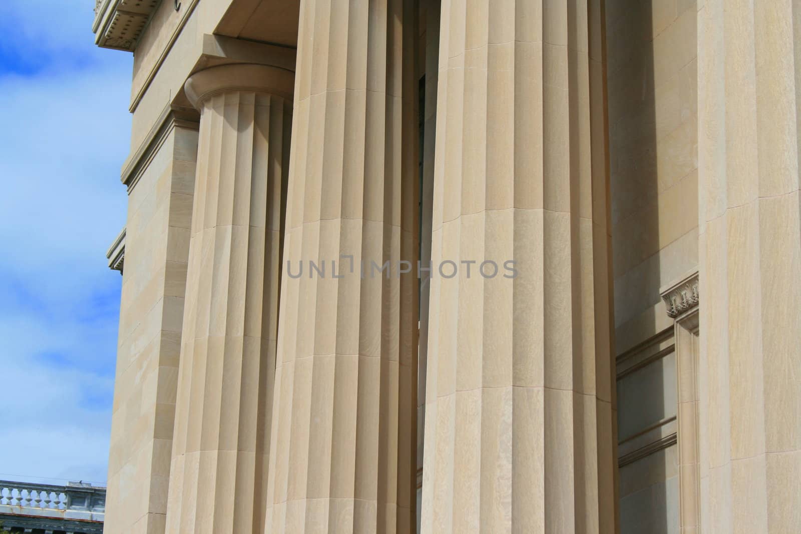 Row of columns showing unique architecture of a building.
