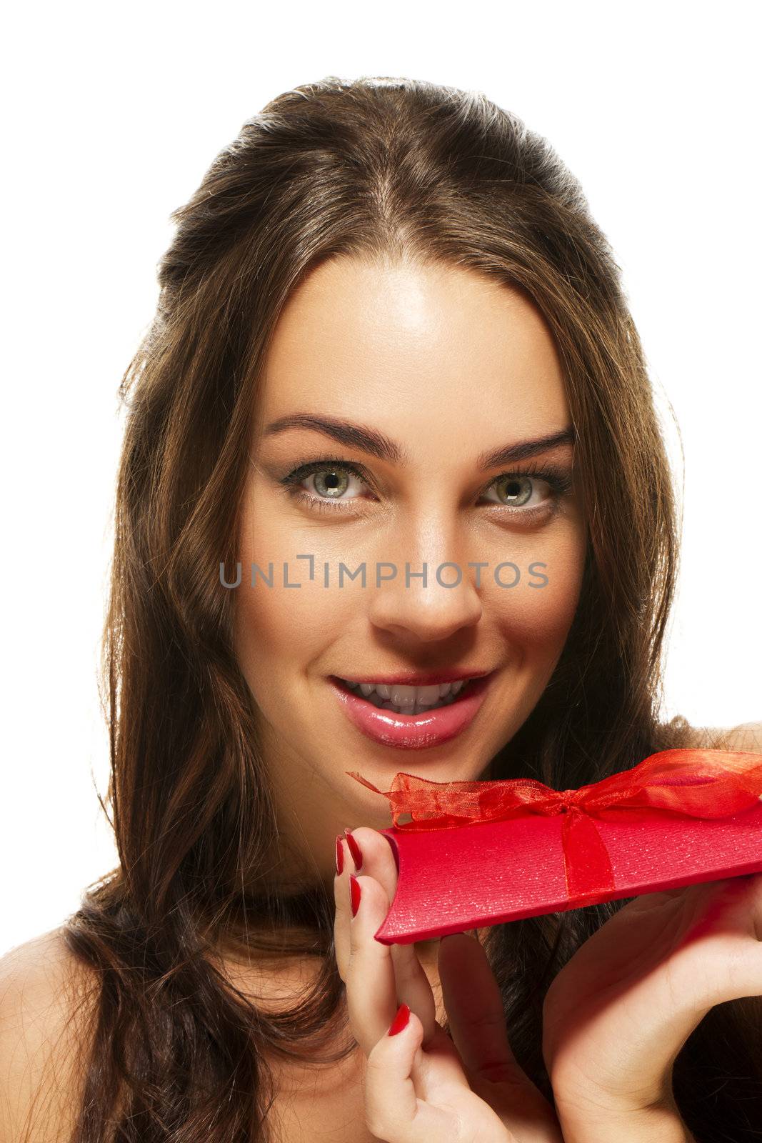 beautiful woman holding present on white background