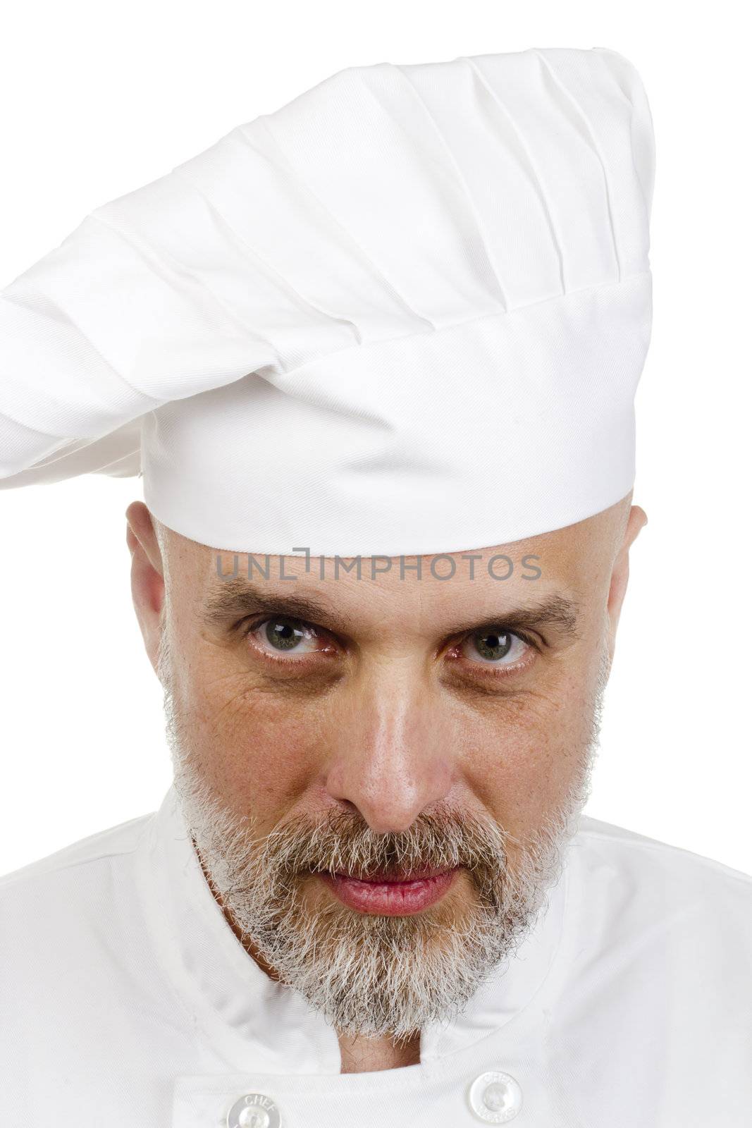 Portrait of a happy chef in a chef's hat.