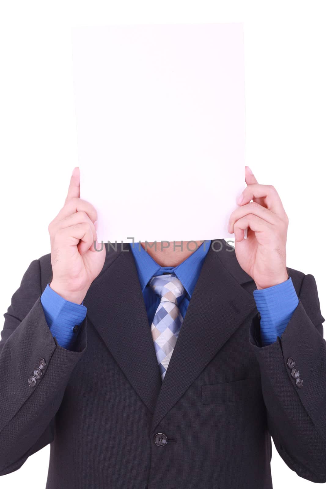 A businessman with a blank paper in his face isolated on white