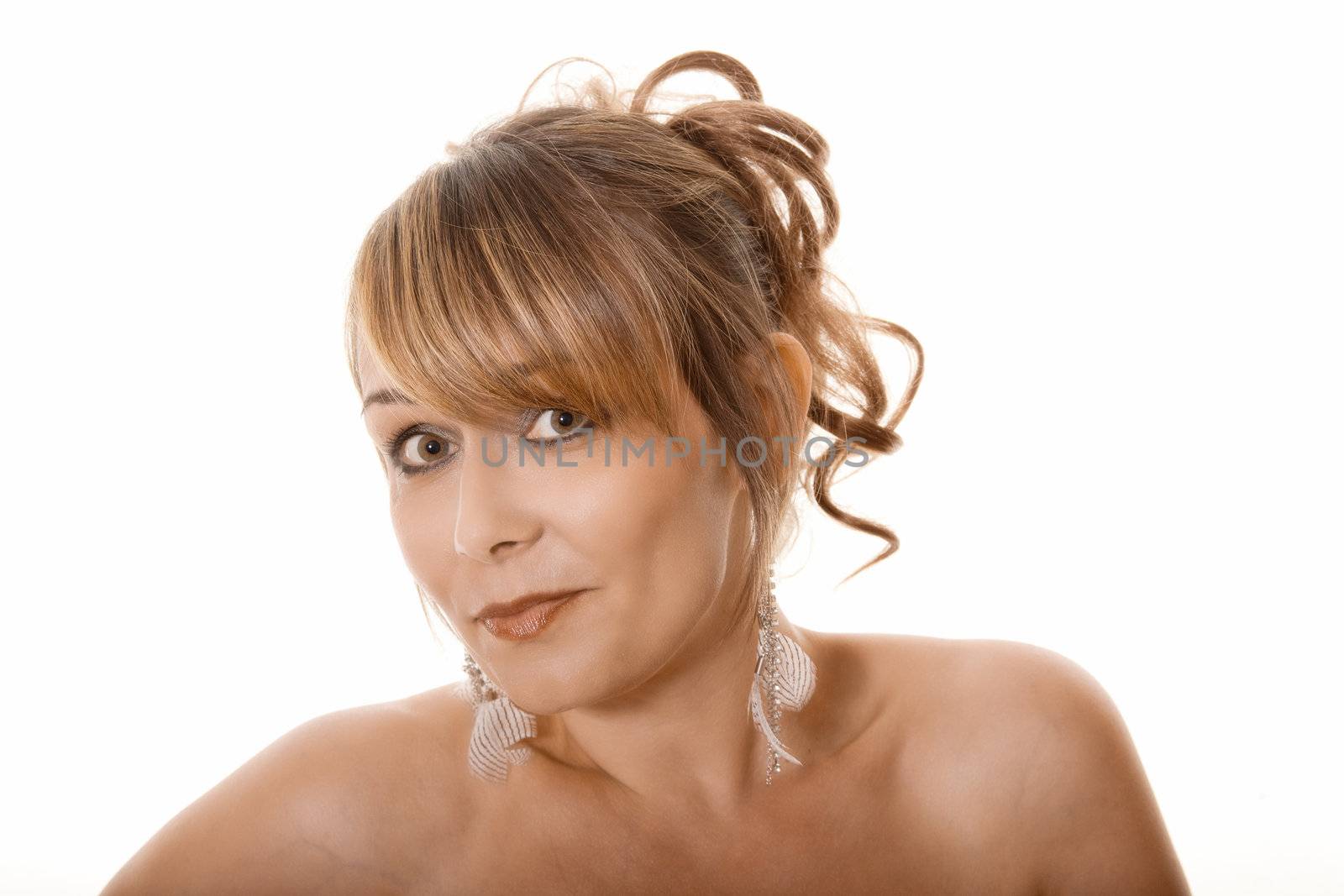 Portrait of woman looking wide eyed at camera isolated on white