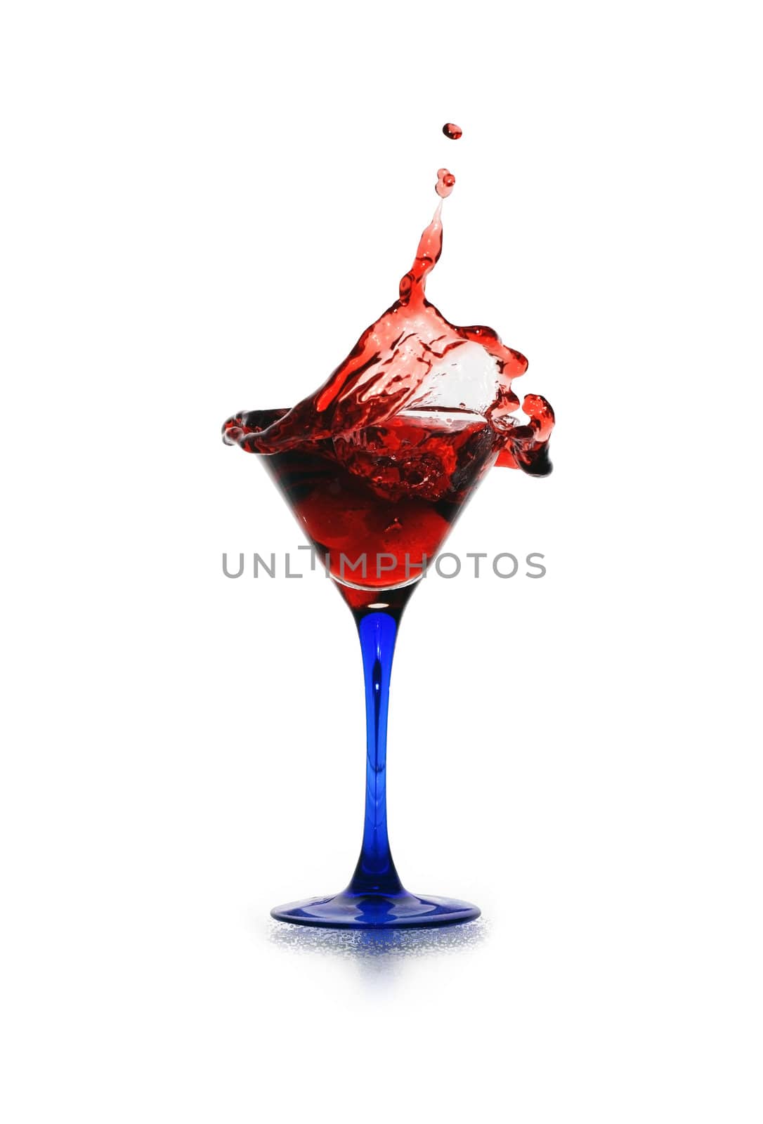 Red splashing cocktail isolated on white background with clipping path