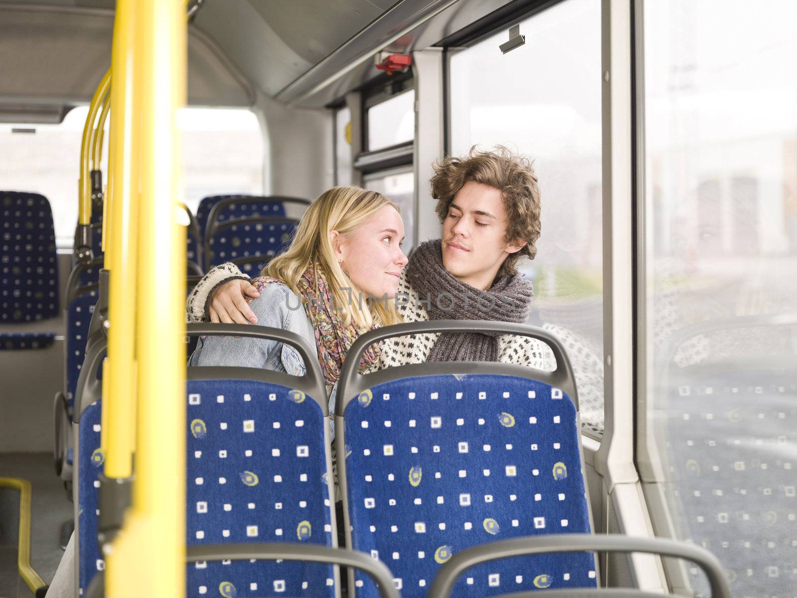 Young couple alone on the bus