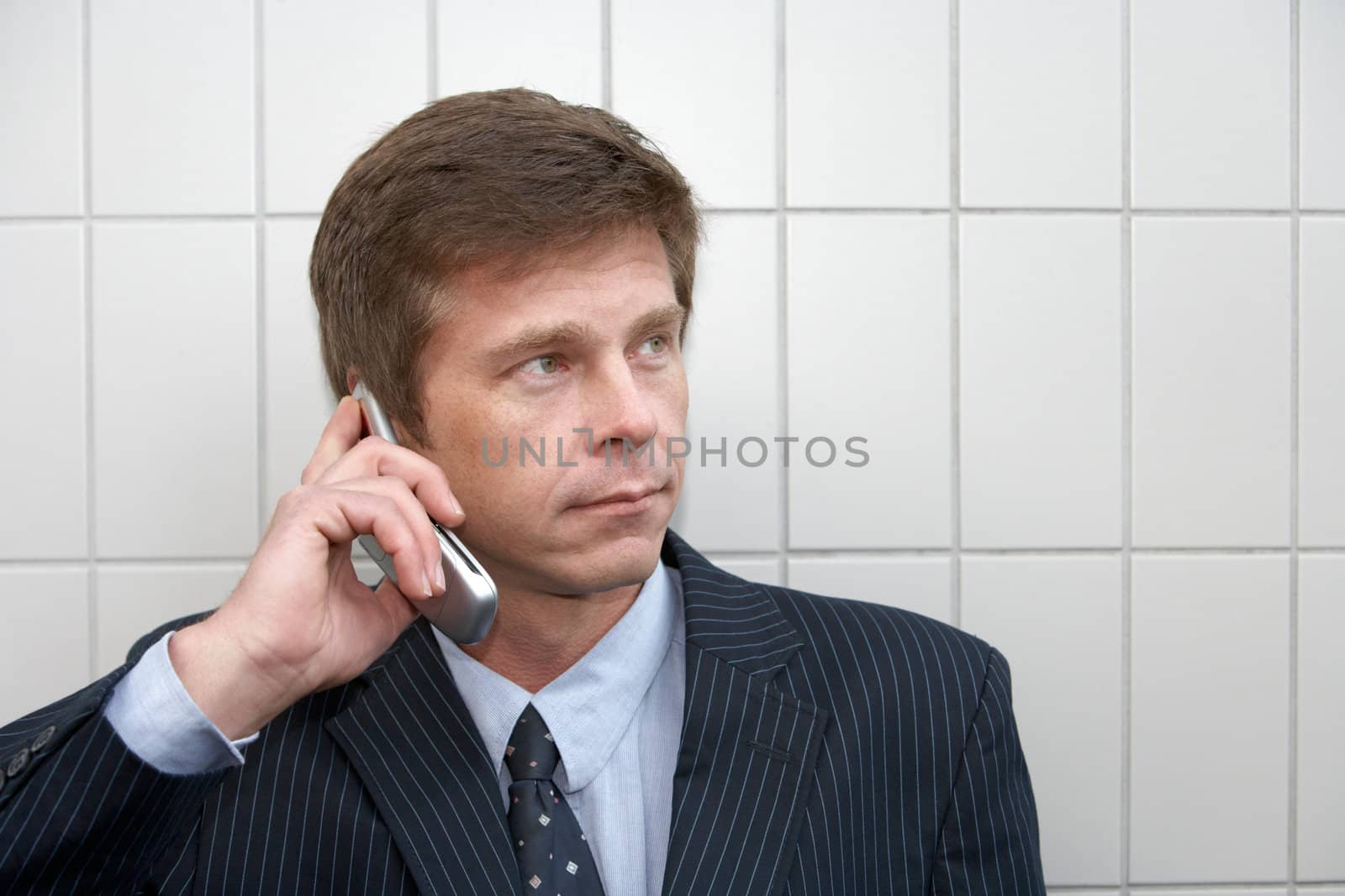 Portrait of man using cell phone