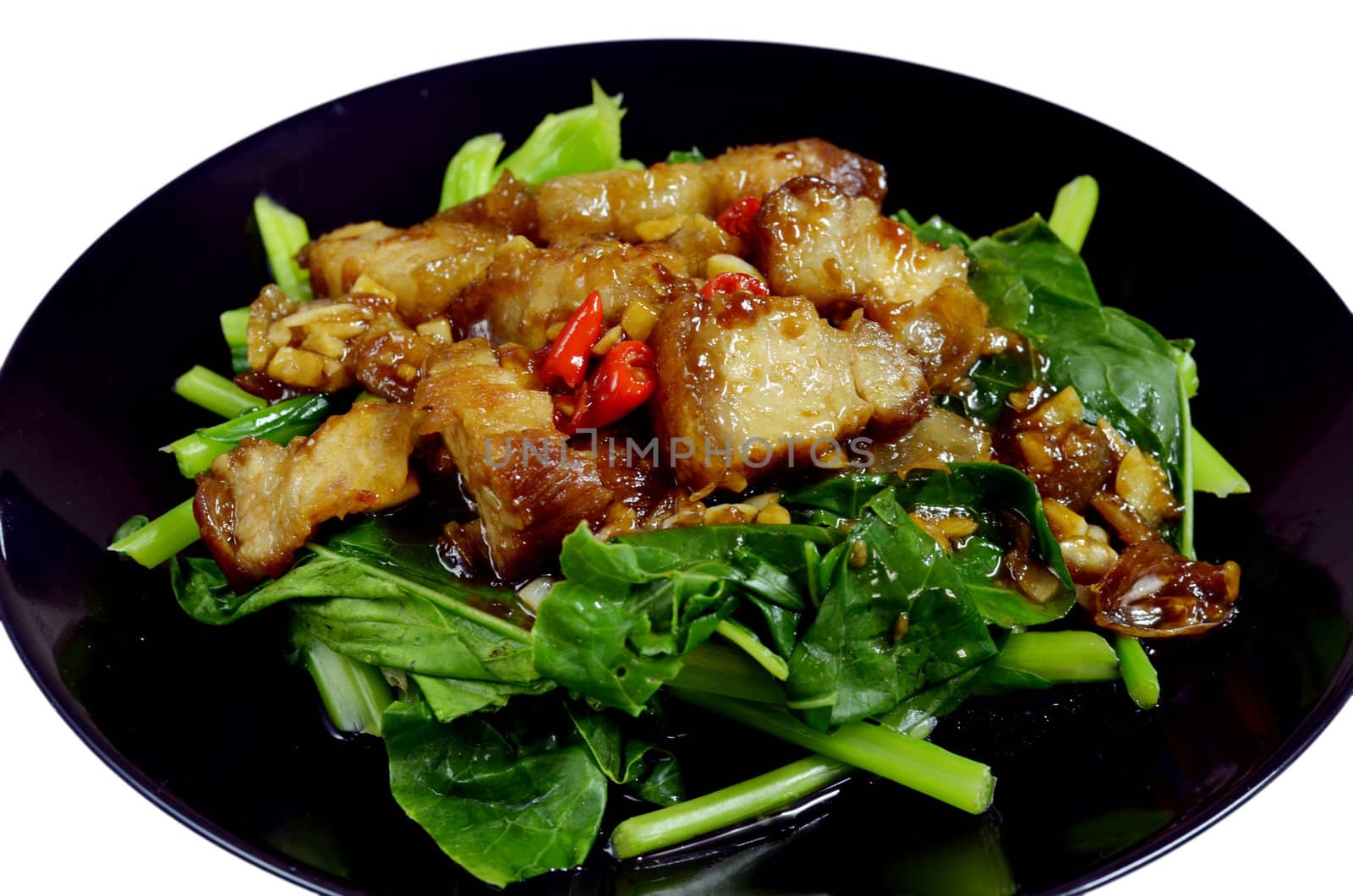 Thai stir fried chinese kale with crispy pork