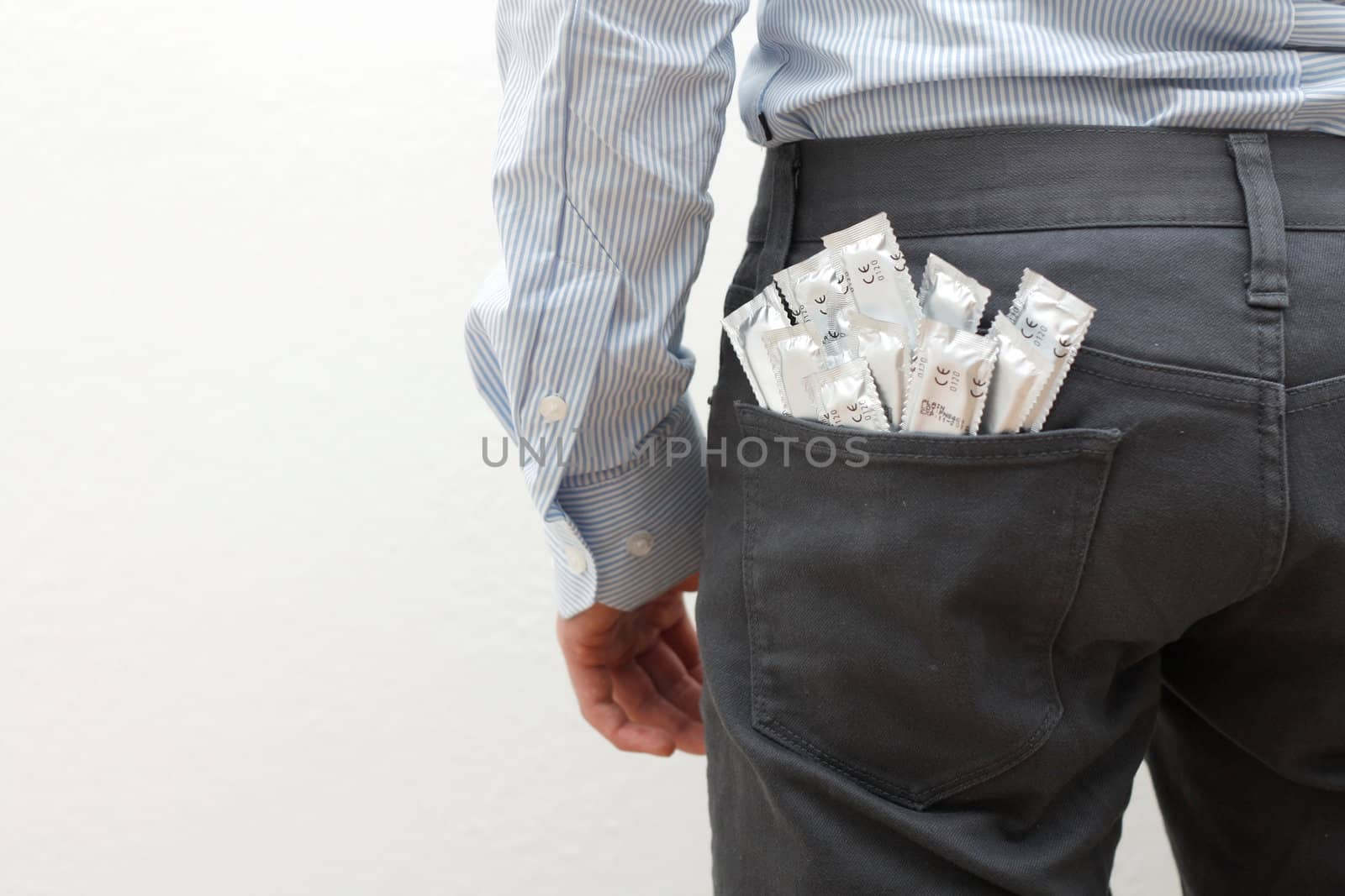 Condoms in the back pocket