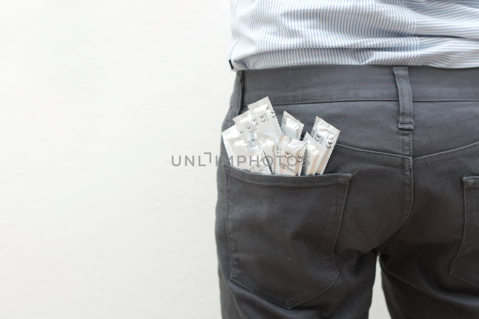 Condoms in the back pocket