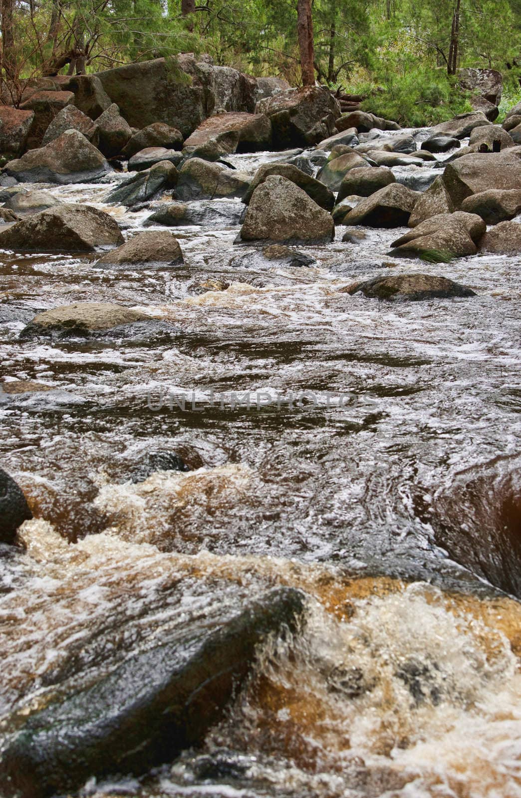rushing water in river  by clearviewstock