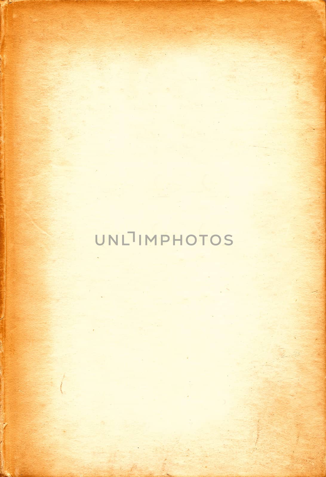 Grungy backdrop of old paper texture in yellow and orange tones