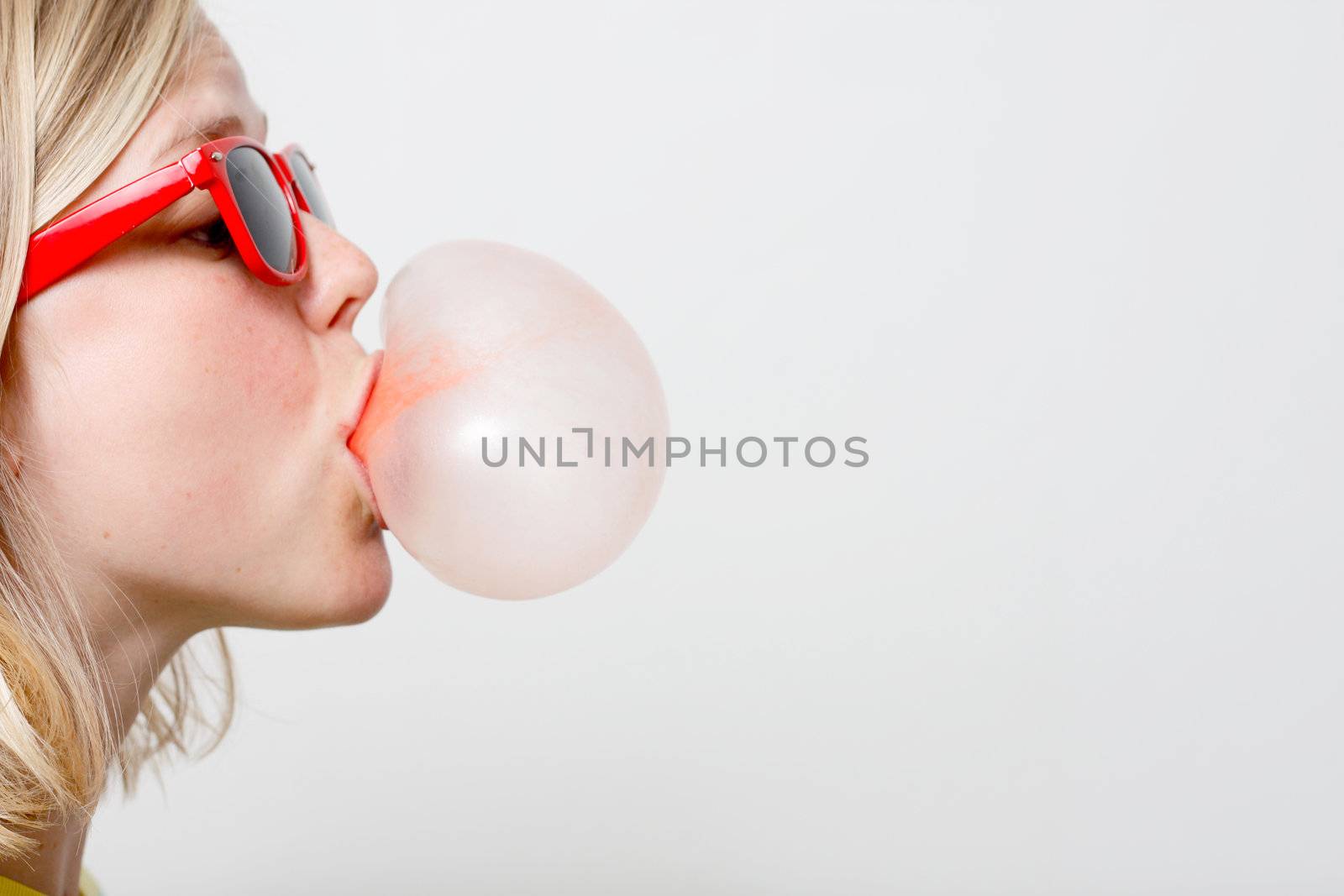 Girl playing with gum by leeser