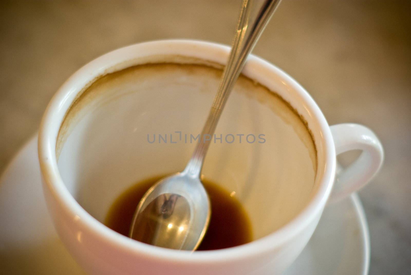 Spoon in coffee cup by pixbox77