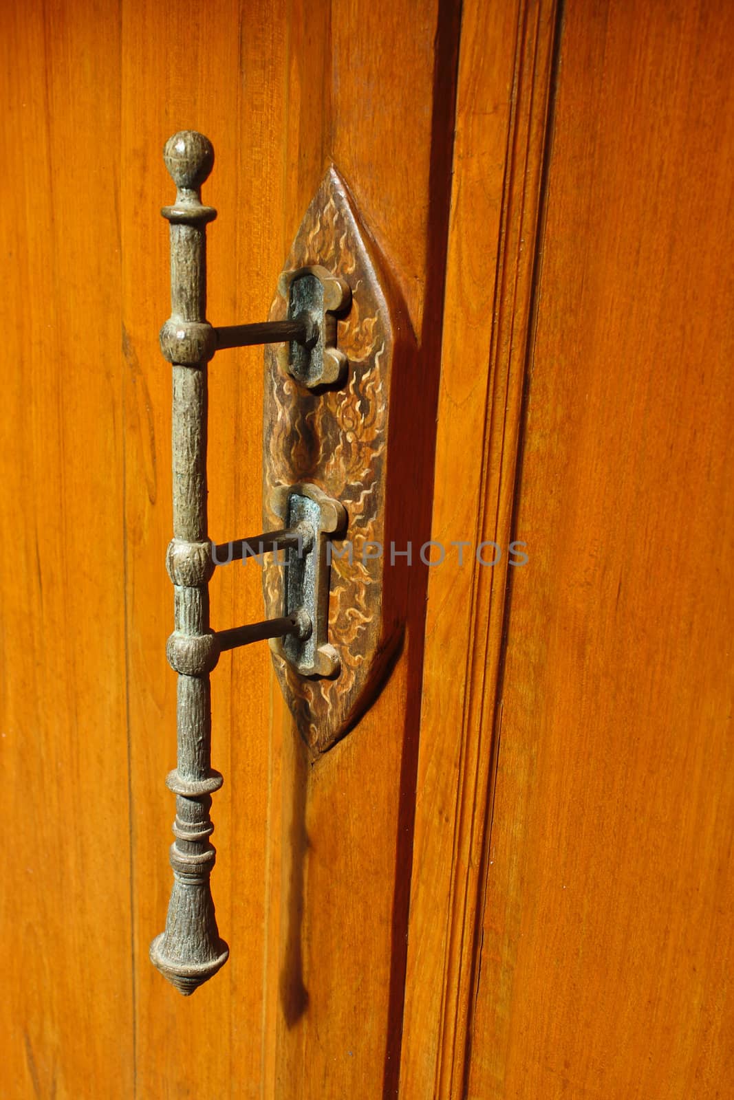 Wood door with metal handle