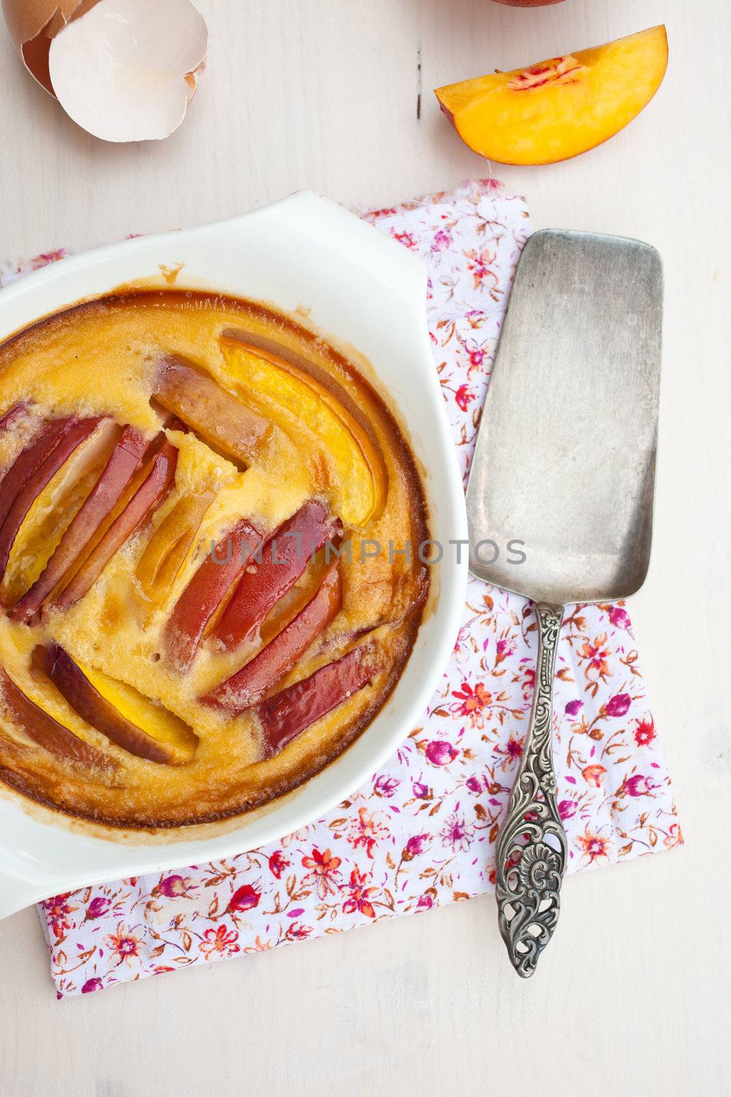 Delicious and baked dessert with egg and nectarines