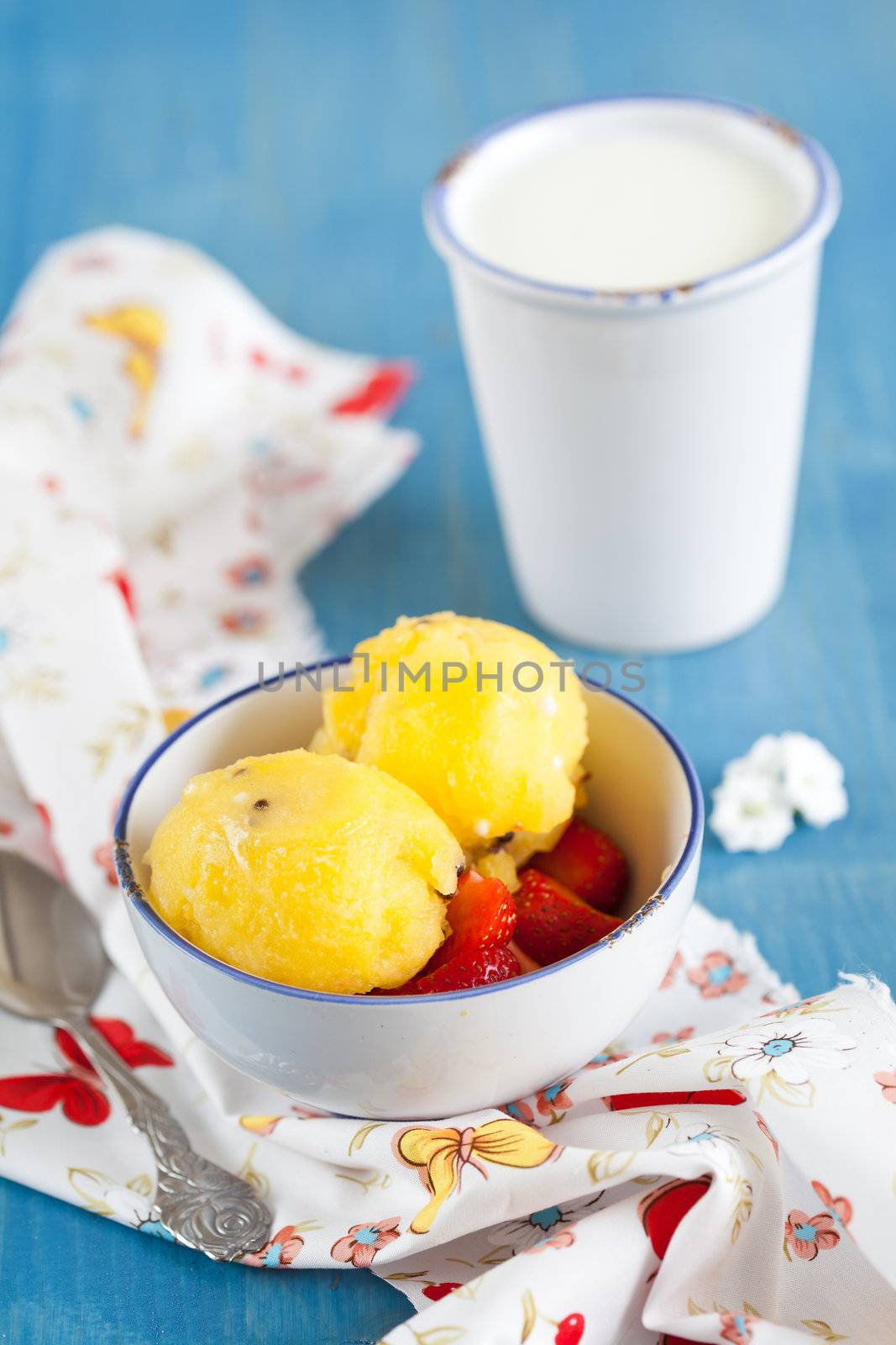 Delicious icrecream made with yellow watermelons on blue background