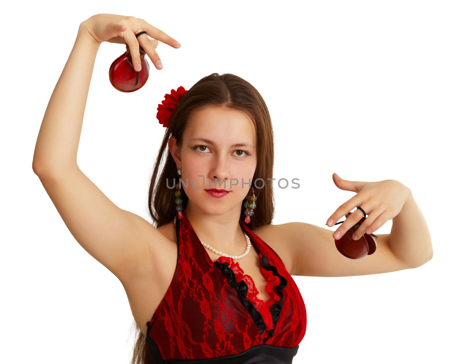 Young girl performing Spanish dance isolated on white background