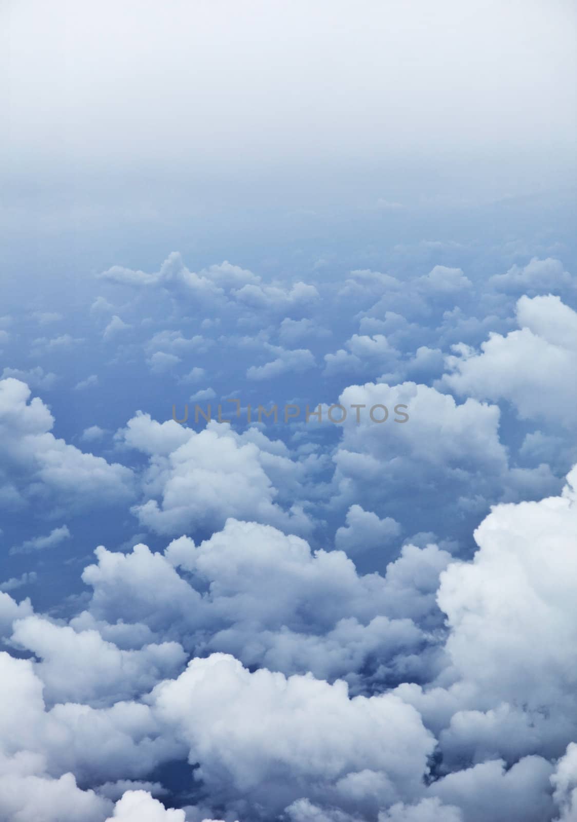 Vertical background - photo of the clouds from a bird's eye