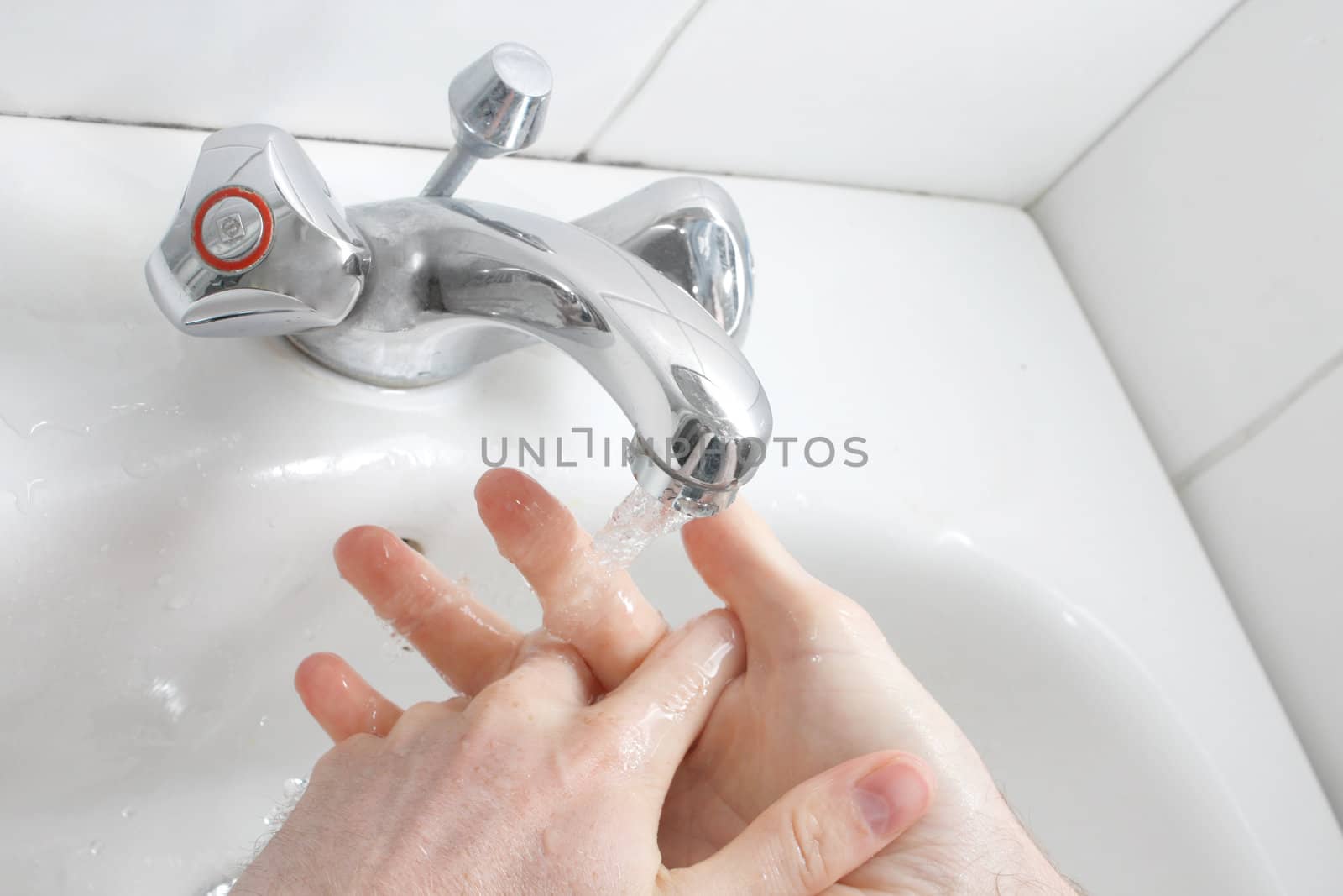 A man washing his hands