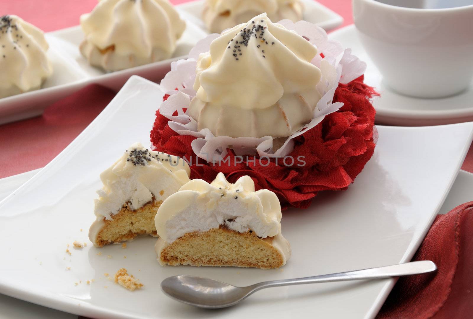 Cookies with zefirnoy filling in milk glaze with a cup of coffee