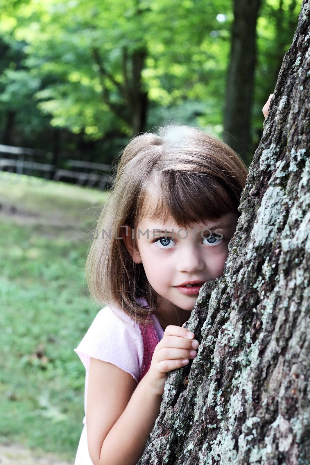 Child Leaning Against an Oak Tree by StephanieFrey