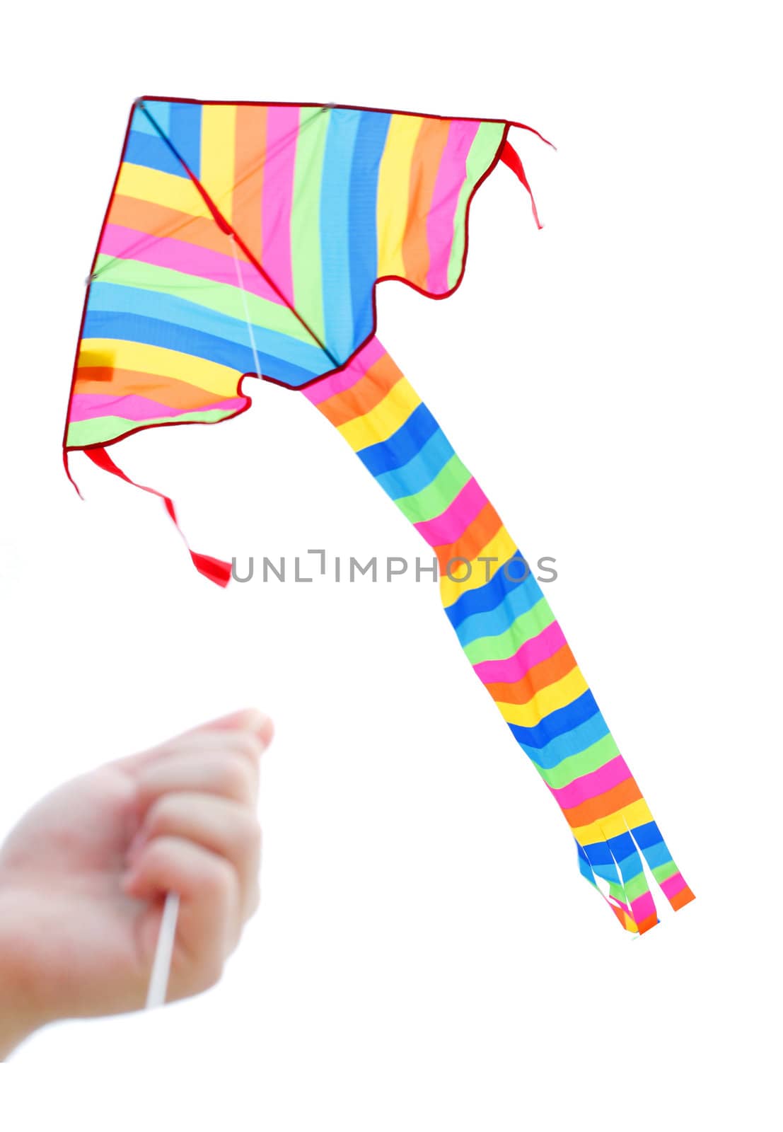 A boy playing with a kite