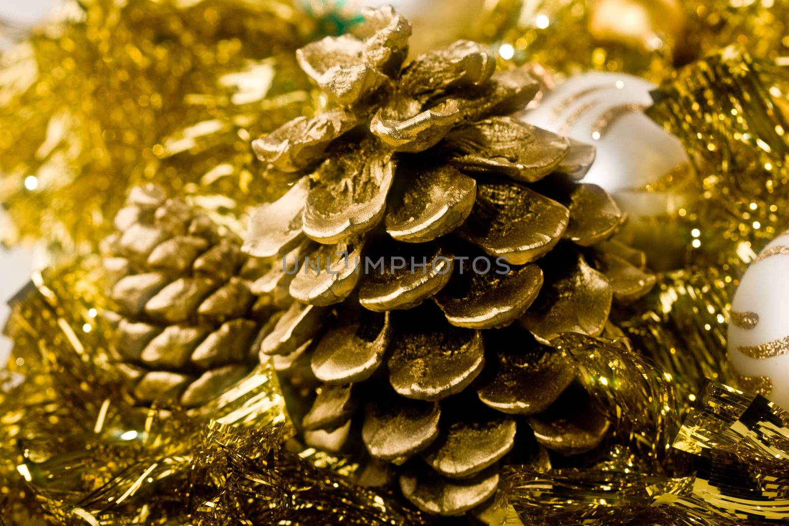holiday series: white Christmas ball, golden cone and garland