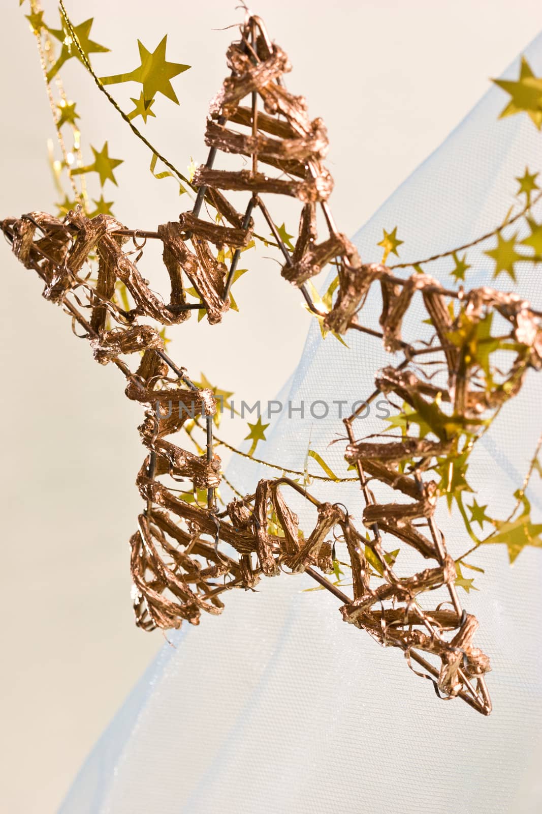 holiday series: golden hand-made christmas star-shaped decoration