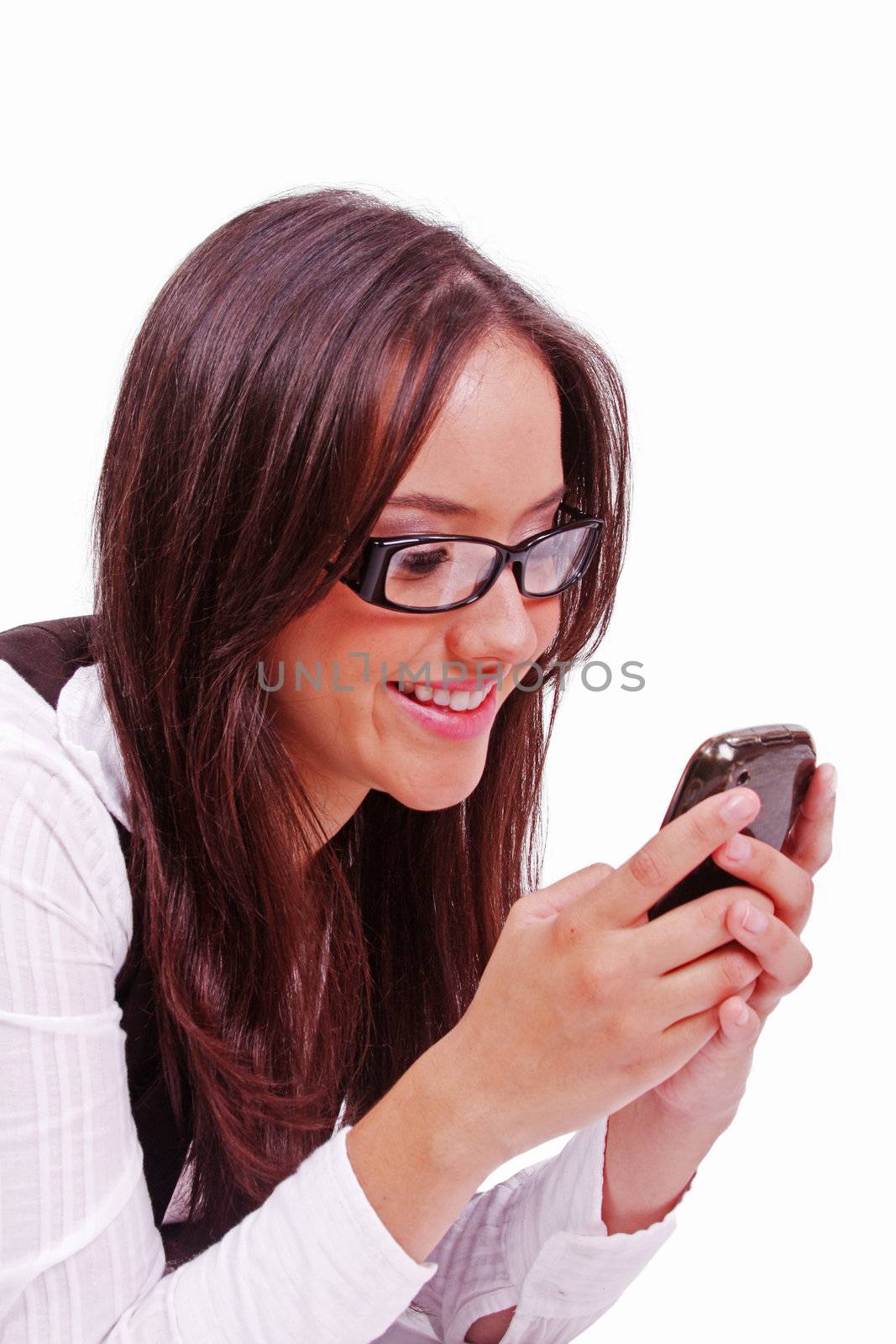 Beutiful happy woman sending text at mobile phone by dacasdo