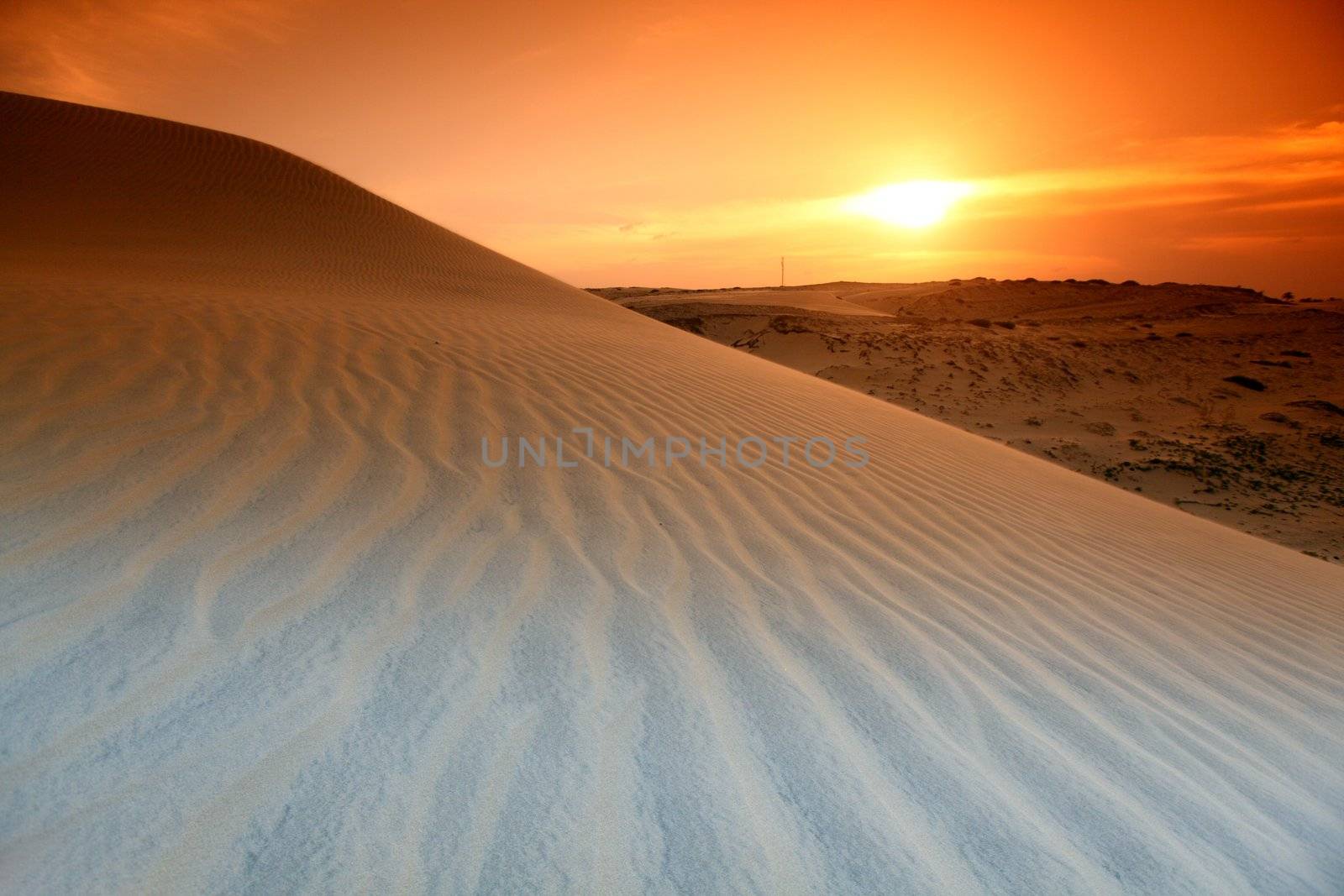 desert sand under blue sunny sky