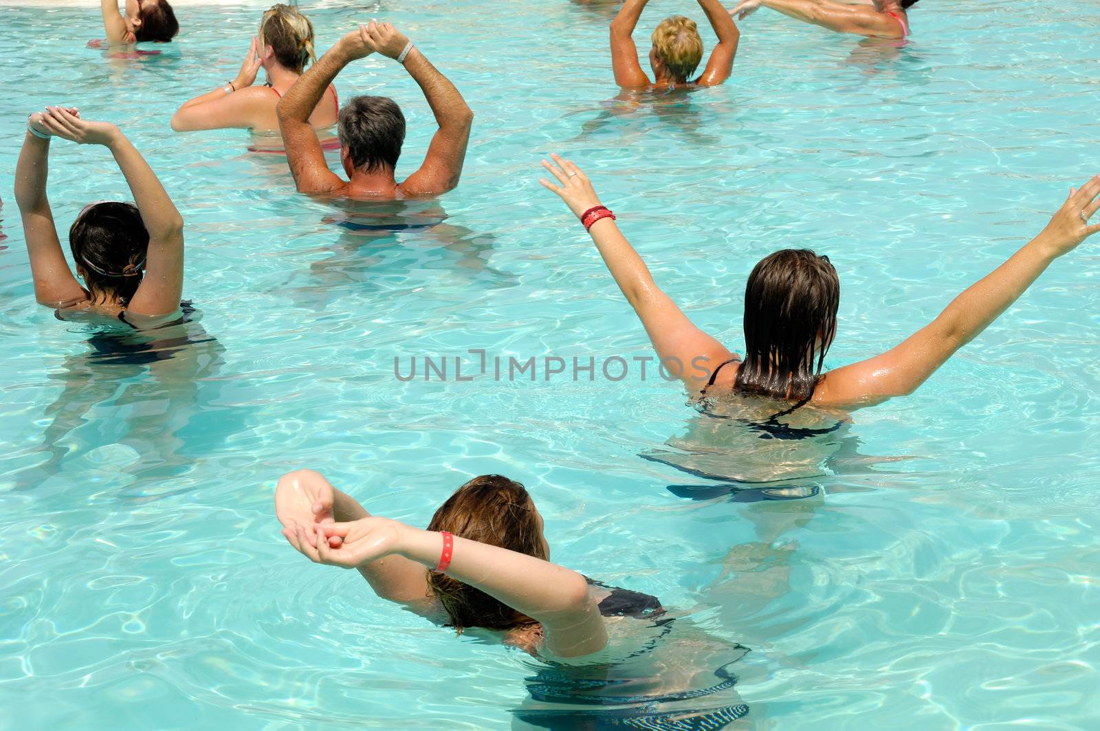 People are doing aerobic in pool
